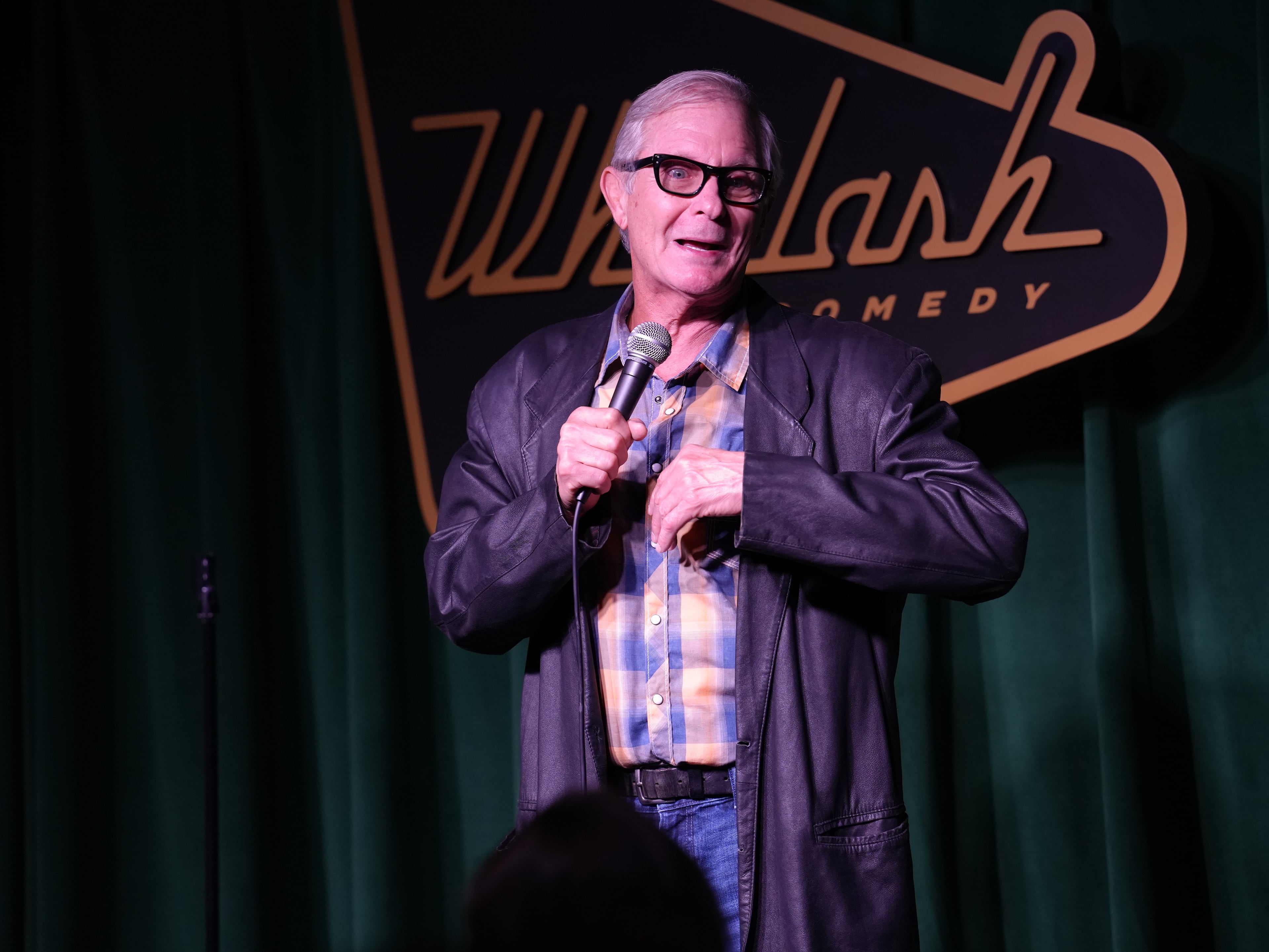 Ritch Shydner, who has been doing stand-up since 1977, came from Asheville, North Carolina, to crack jokes on opening night of Whiplash Comedy Club on Oct. 8, 2026 for friends and family. (Courtesy of Adriana Gooden)