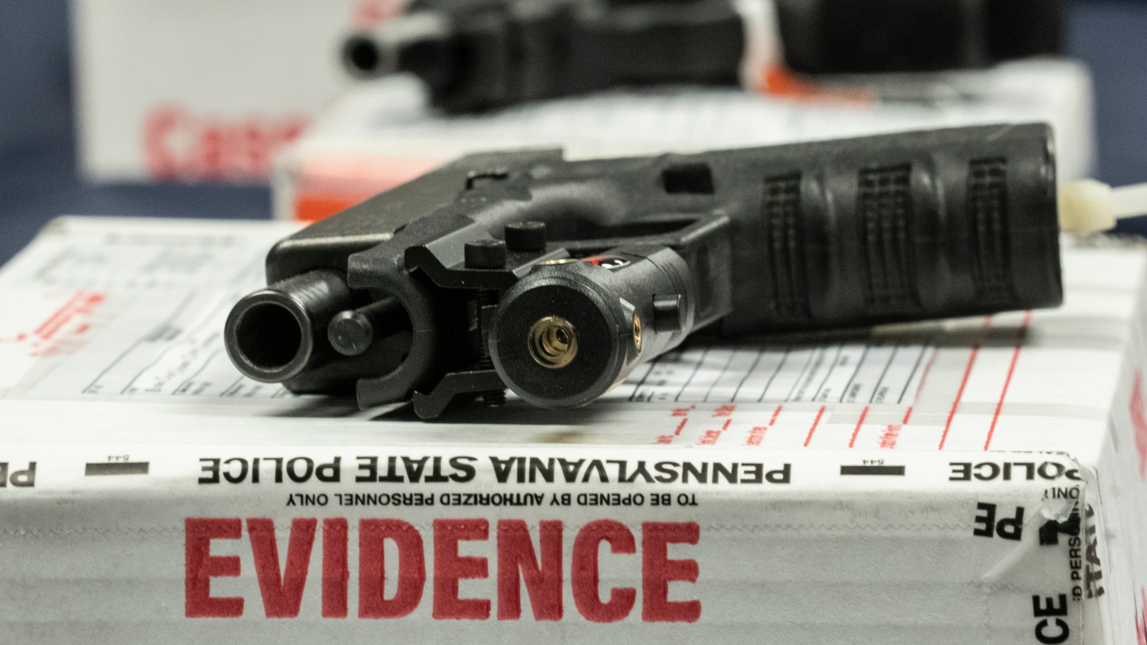 FILE - Shown are alleged straw purchased weapons displayed during a news conference in Norristown, Pa., Feb. 22, 2023. (AP Photo/Matt Rourke, File)