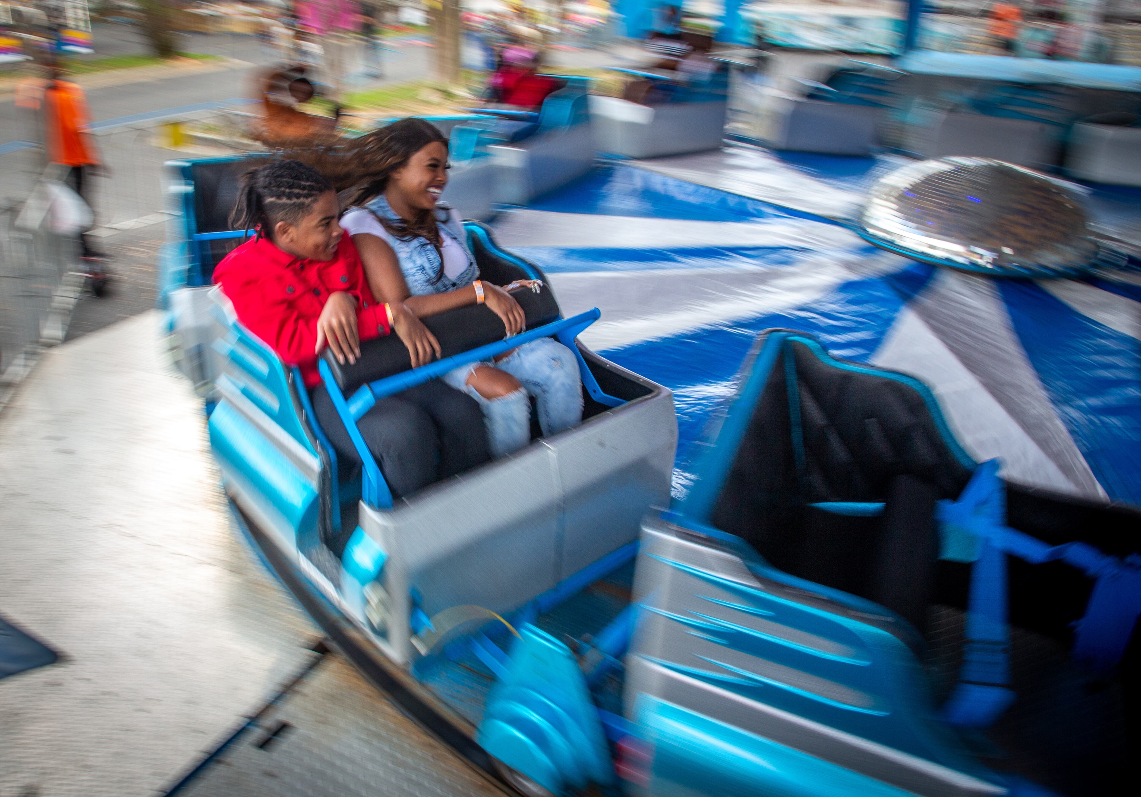 People enjoy the rides at the Atlanta Fair on Sunday, March 6, 2022. This was the opening weekend for the annual fair that runs through April 10. (Photo by Steve Schaefer for The Atlanta Journal-Constitution)