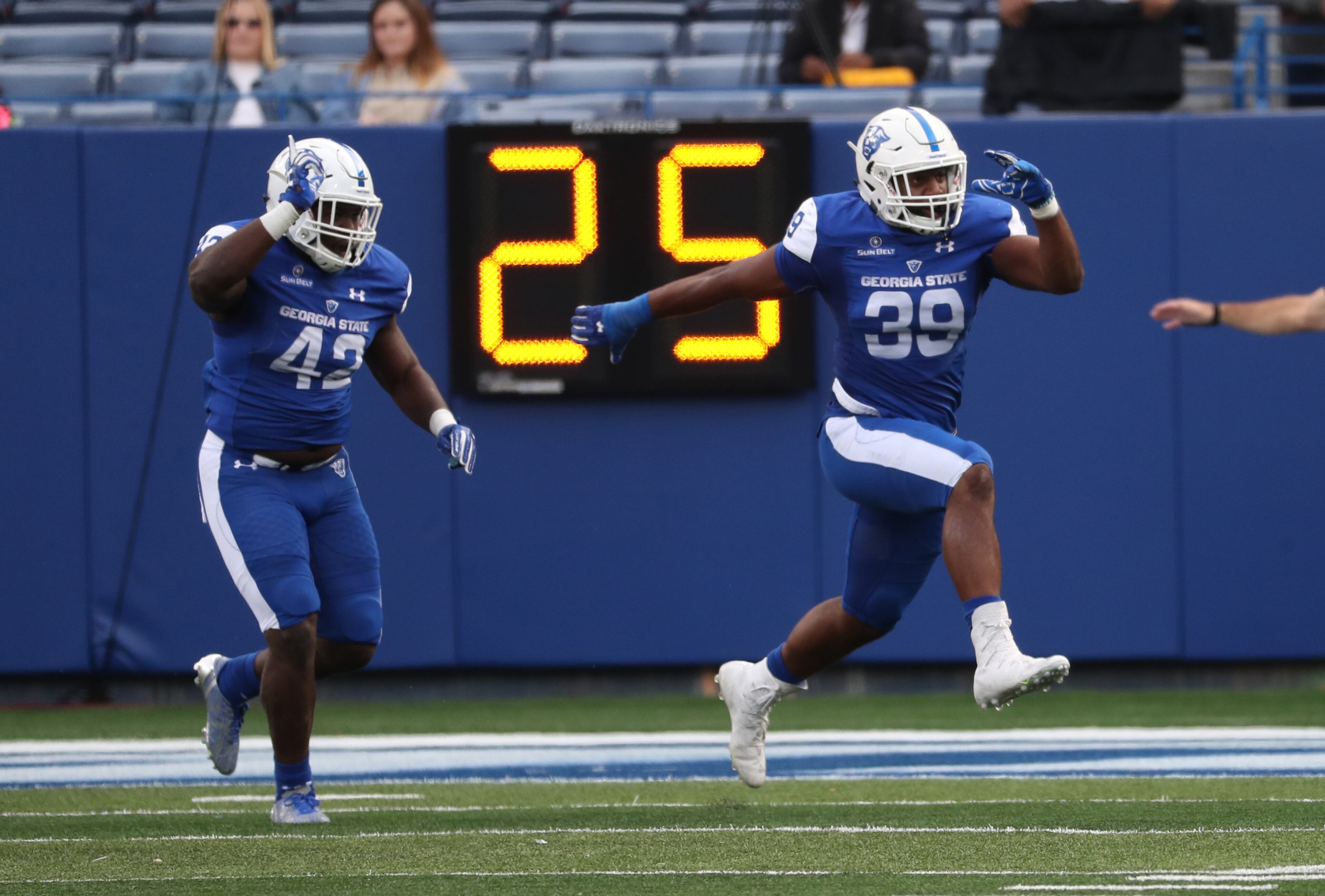 November 25, 2017 - Atlanta, Ga: Georgia State Panthers linebacker Trey Payne (42) and linebacker Chase Middleton (39) celebrate a goal line stand in the second quarter against Appalachian State at GSU Stadium Saturday, November 25, 2017, in Atlanta. PHOTO / JASON GETZ