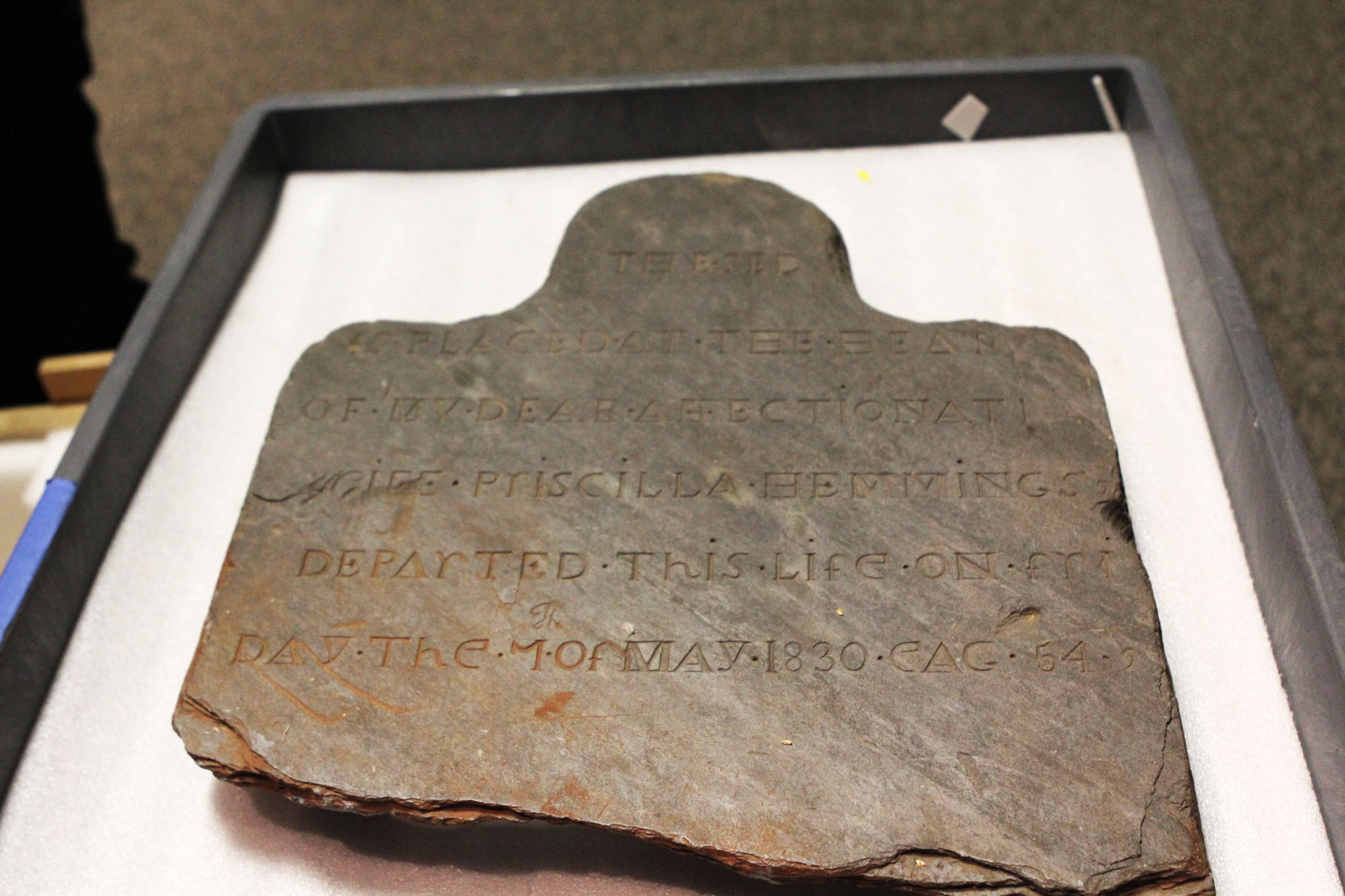 The headstone of Priscilla Hemings is prepped for the Atlanta History Center exhibit "Slavery at Jefferson's Monticello: How the Word is Passed Down."