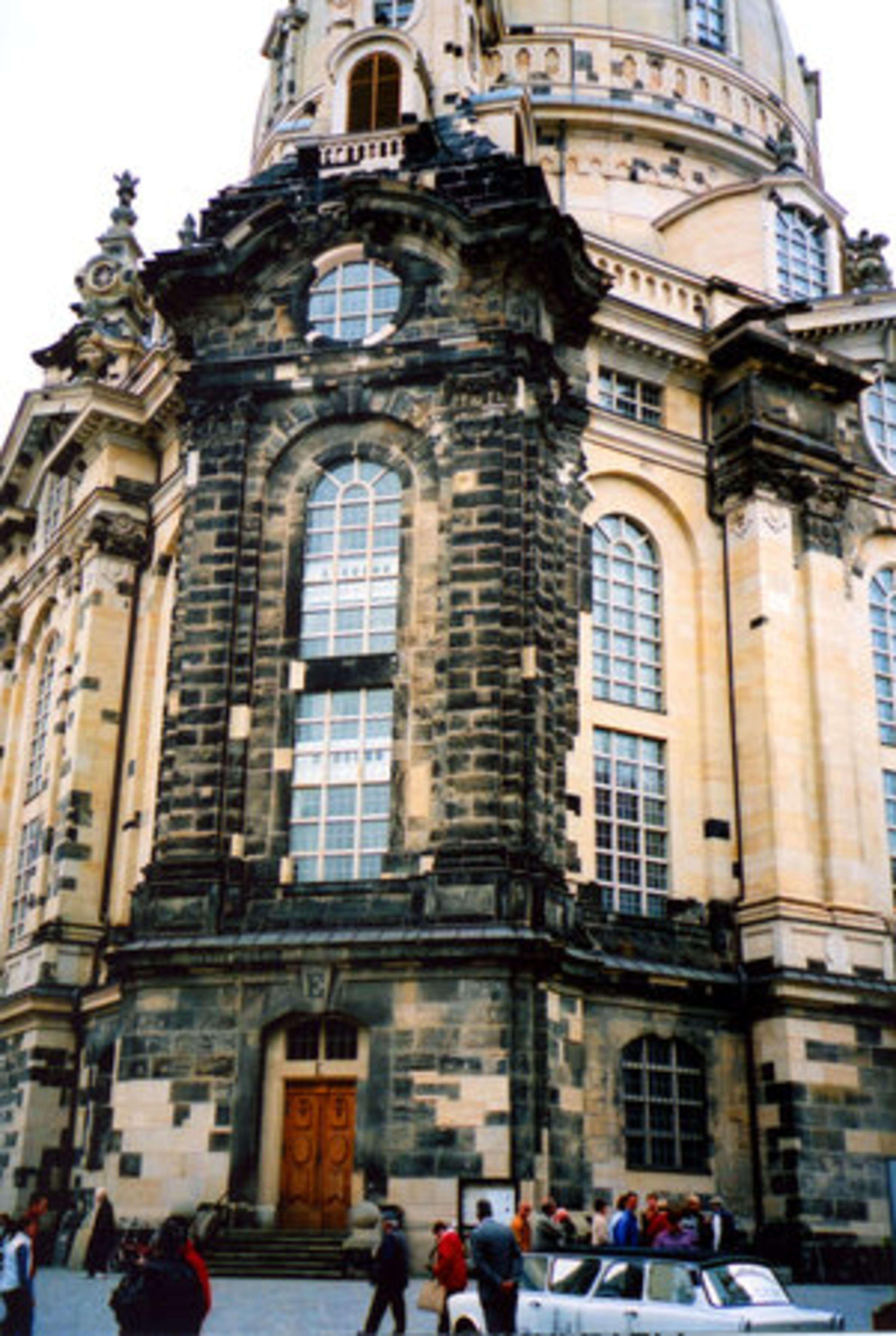 Hundreds of the original sandstone blocks were salvaged, cleaned and reused in the rebuilding of the Frauenkirche. It's easy to tell the original stones; they're the dark ones.