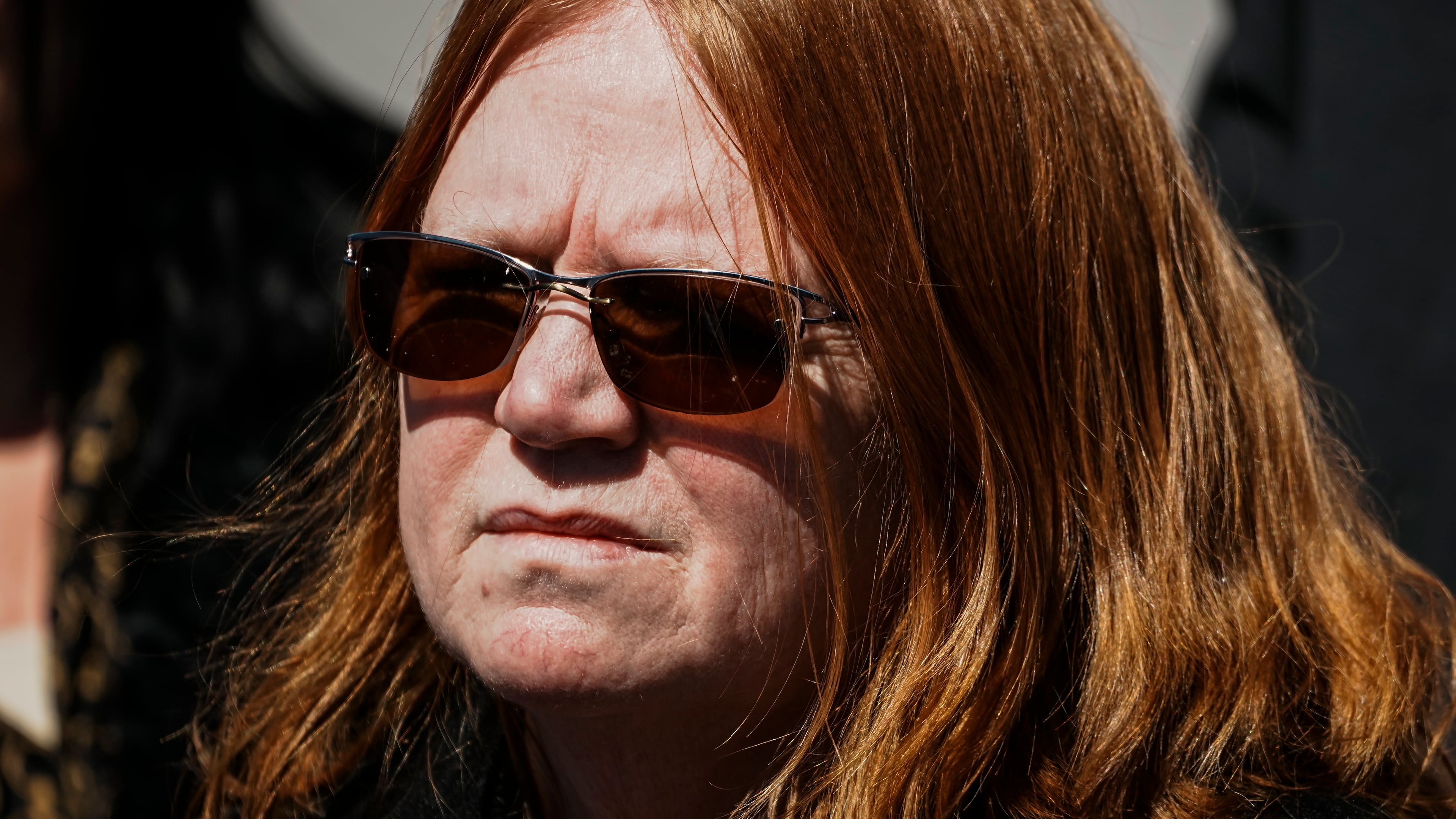Asa Ellerup, wife, of Rex Heuermann waits to give her statement outside the courthouse as Rex Heuermann, accused in Long Island's infamous Gilgo Beach serial killings, pleaded guilty on Wednesday, April 8, 2026, at Suffolk County Court in Riverhead, New York. (AP Photo/Eduardo Munoz Alvarez)