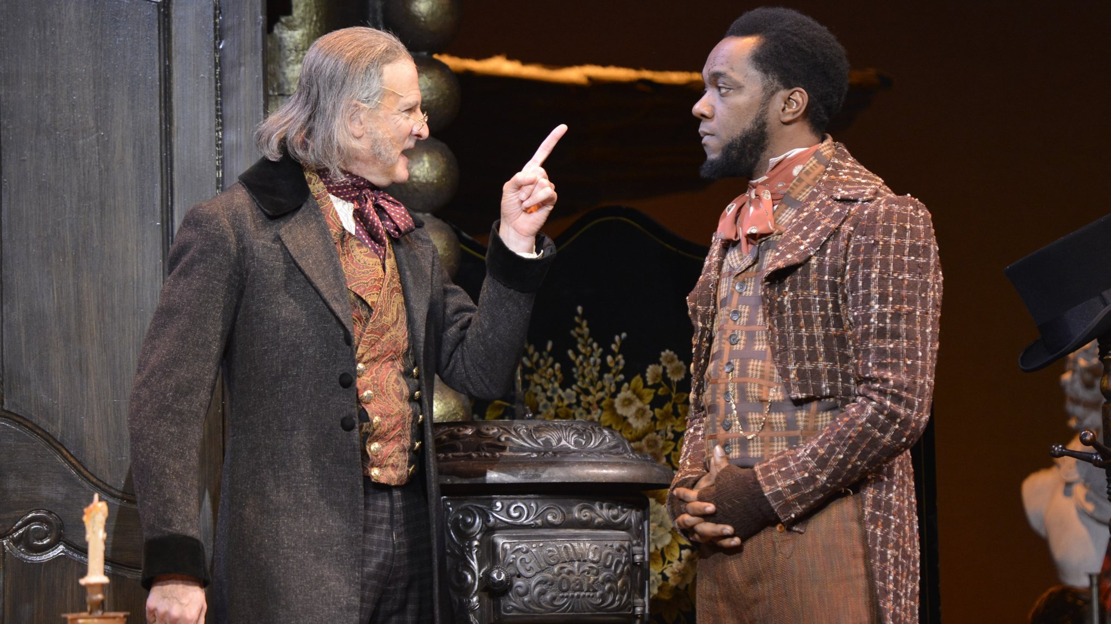 Continuing through Dec. 24, the Alliance Theatre’s “A Christmas Carol” co-stars David de Vries (as Ebenezer Scrooge) and Neal Ghant (as Bob Cratchit). CONTRIBUTED BY GREG MOONEY