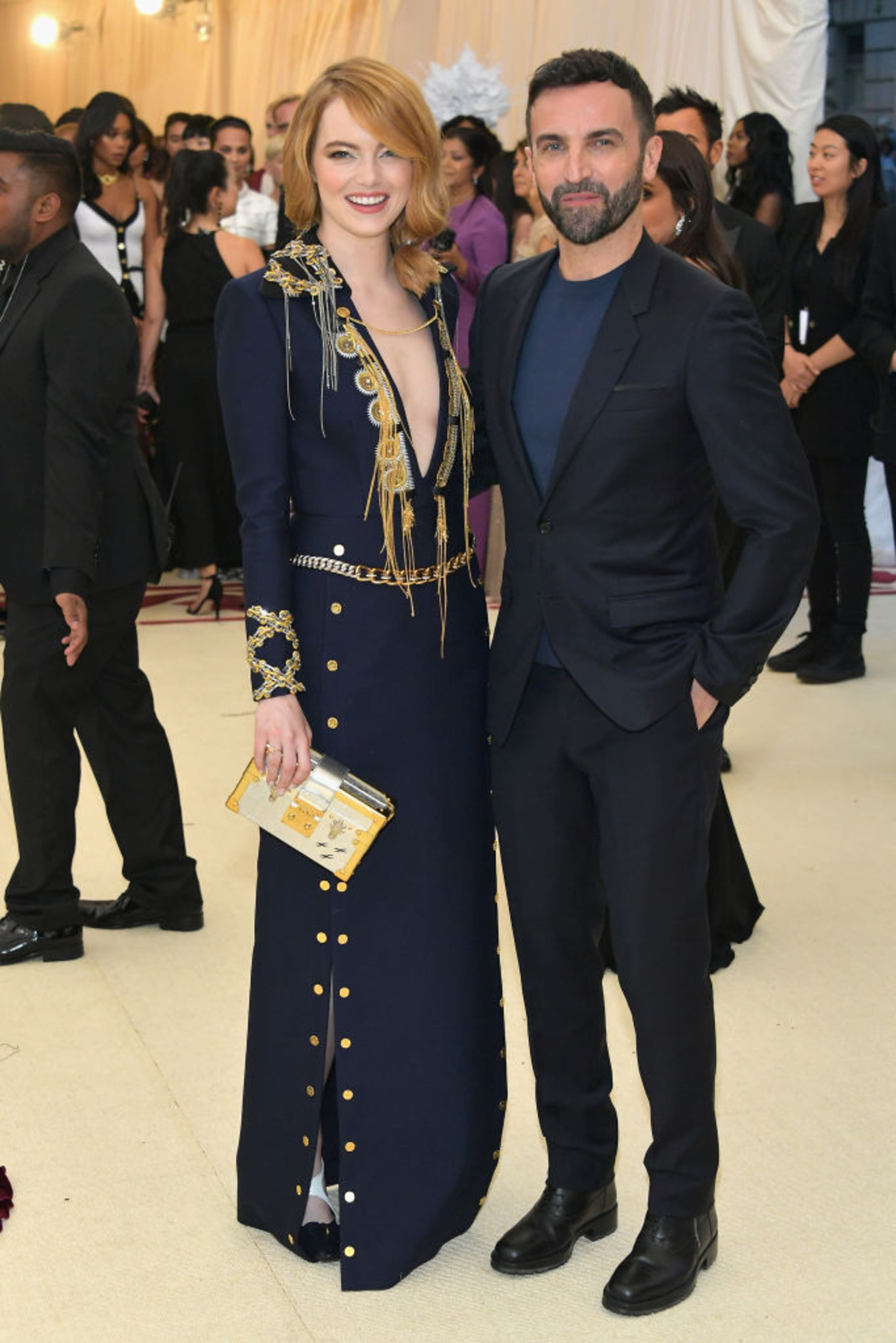 NEW YORK, NY - MAY 07: Emma Stone and designer Nicolas Ghesquiere attend the Heavenly Bodies: Fashion & The Catholic Imagination Costume Institute Gala at The Metropolitan Museum of Art on May 7, 2018 in New York City. (Photo by Neilson Barnard/Getty Images)