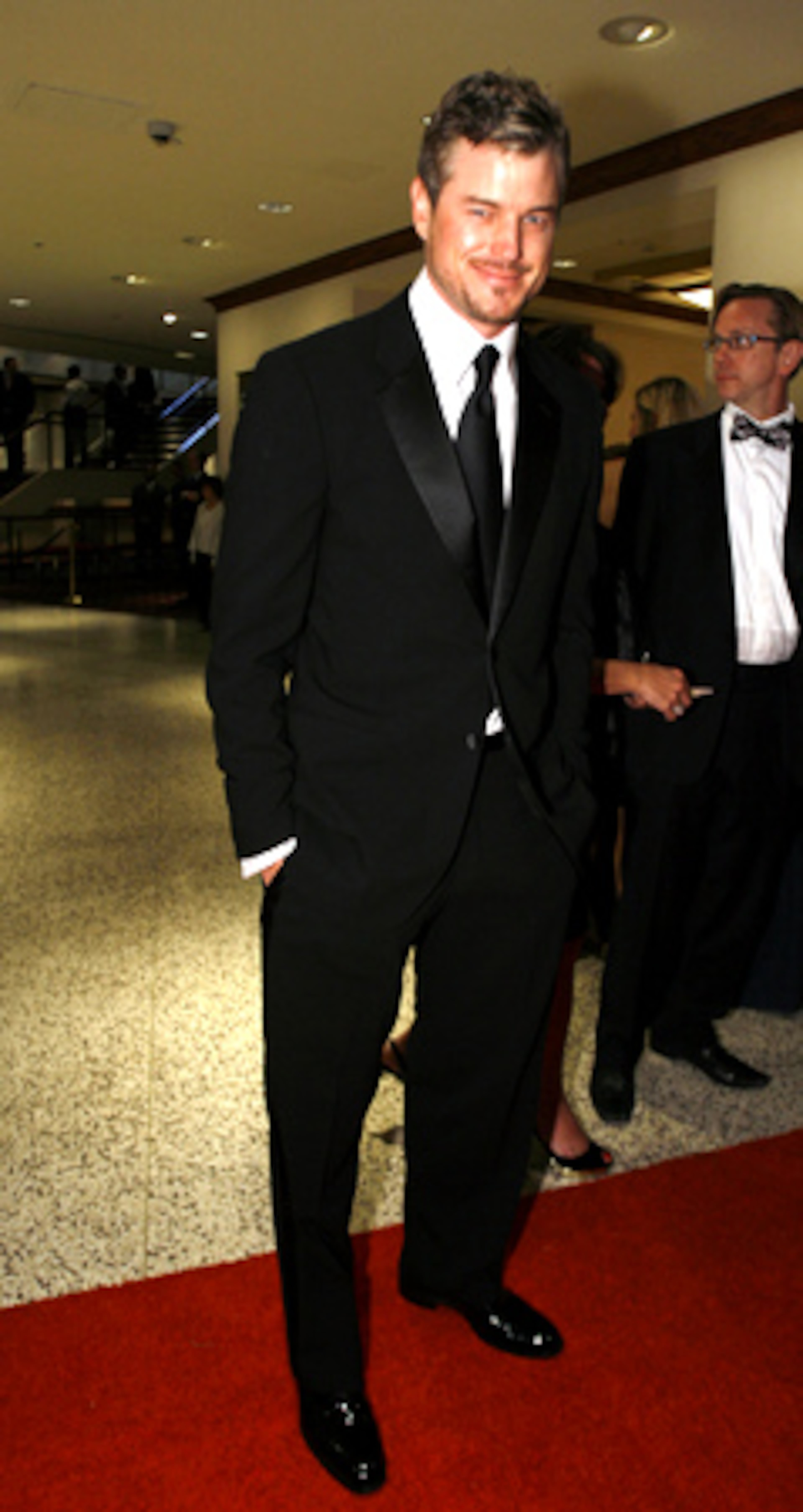 ERIC DANE ("Grey's Anatomy") stops on the red carpet of the Washington Hilton.