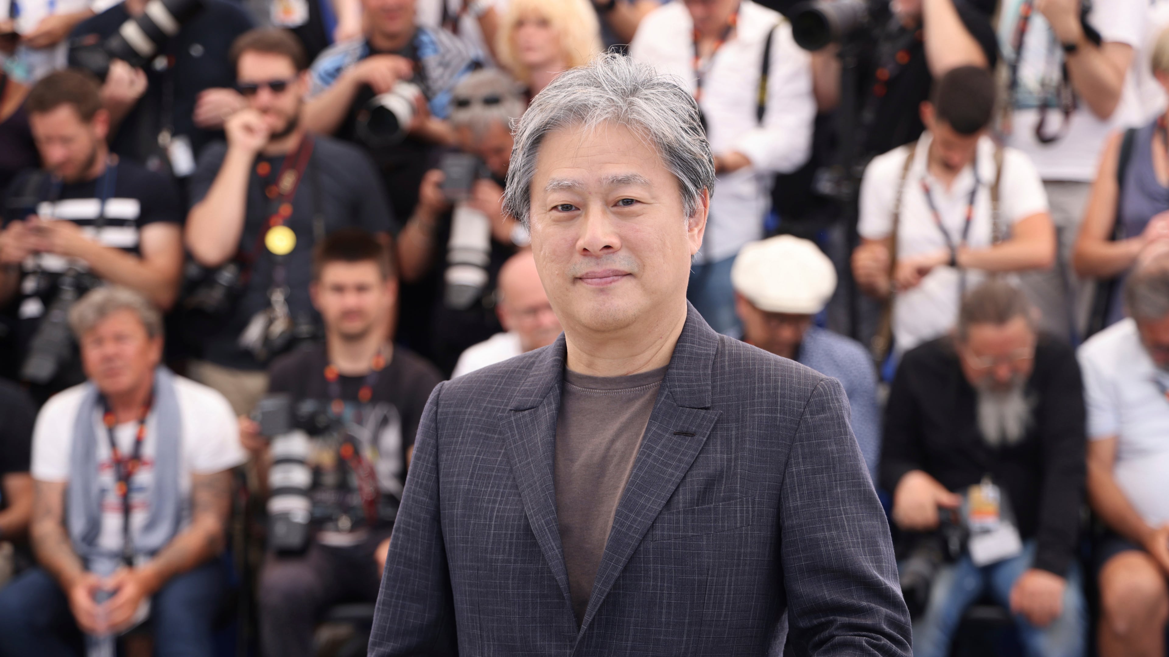 FILE - Director Park Chan-wook poses for photographers at the photo call for the film 'Decision to Leave' at the 75th international film festival, Cannes, southern France, Tuesday, May 24, 2022. (Photo by Vianney Le Caer/Invision/AP, File)