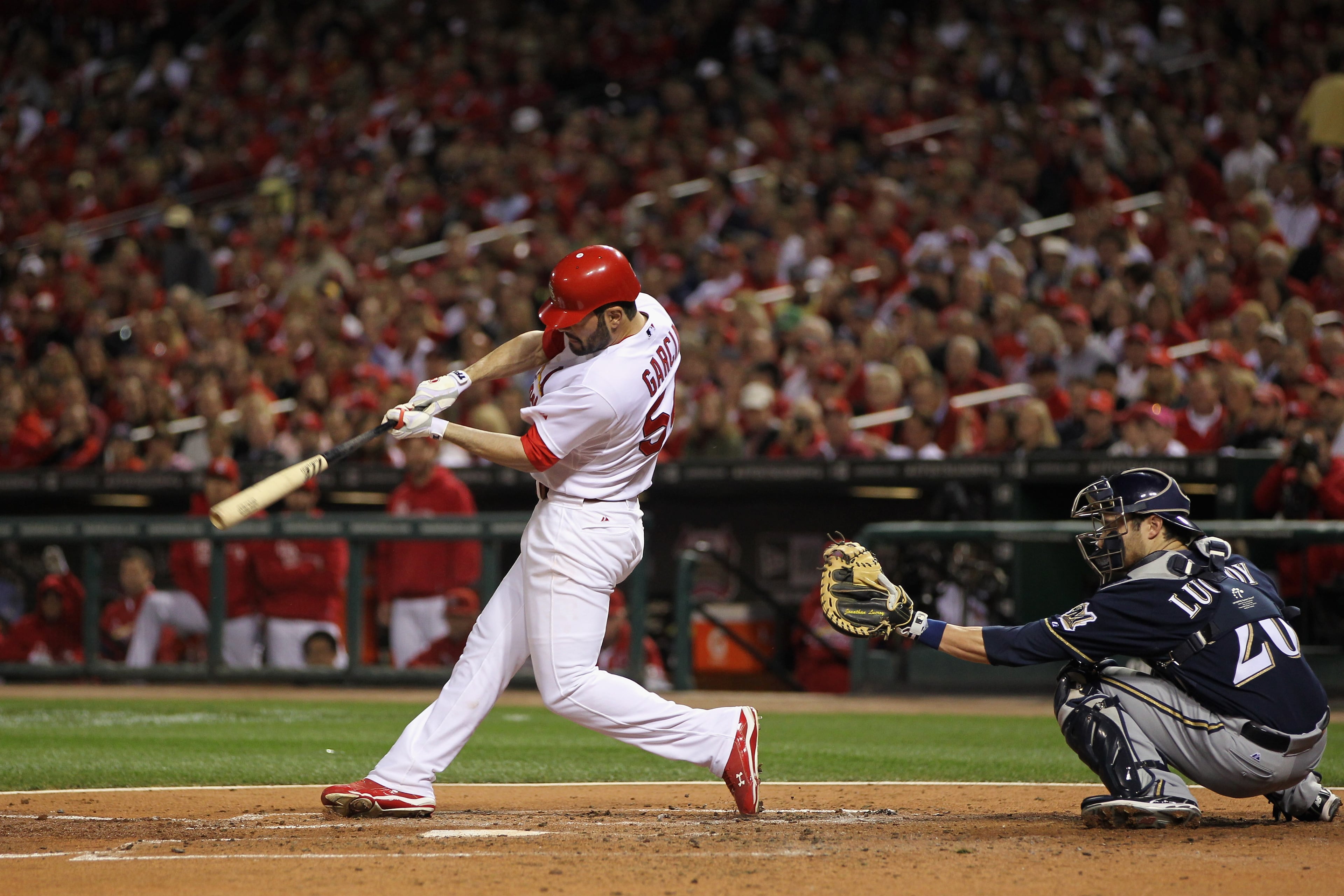 ST LOUIS, MO - OCTOBER 14: Jaime Garcia #54 of the St. Louis Cardinals drives in 2 runs as he reaches base on an error in the bottom of ther second inning against th emb during Game Five of the National League Championship Series at Busch Stadium on October 14, 2011 in St Louis, Missouri. (Photo by Jamie Squire/Getty Images)