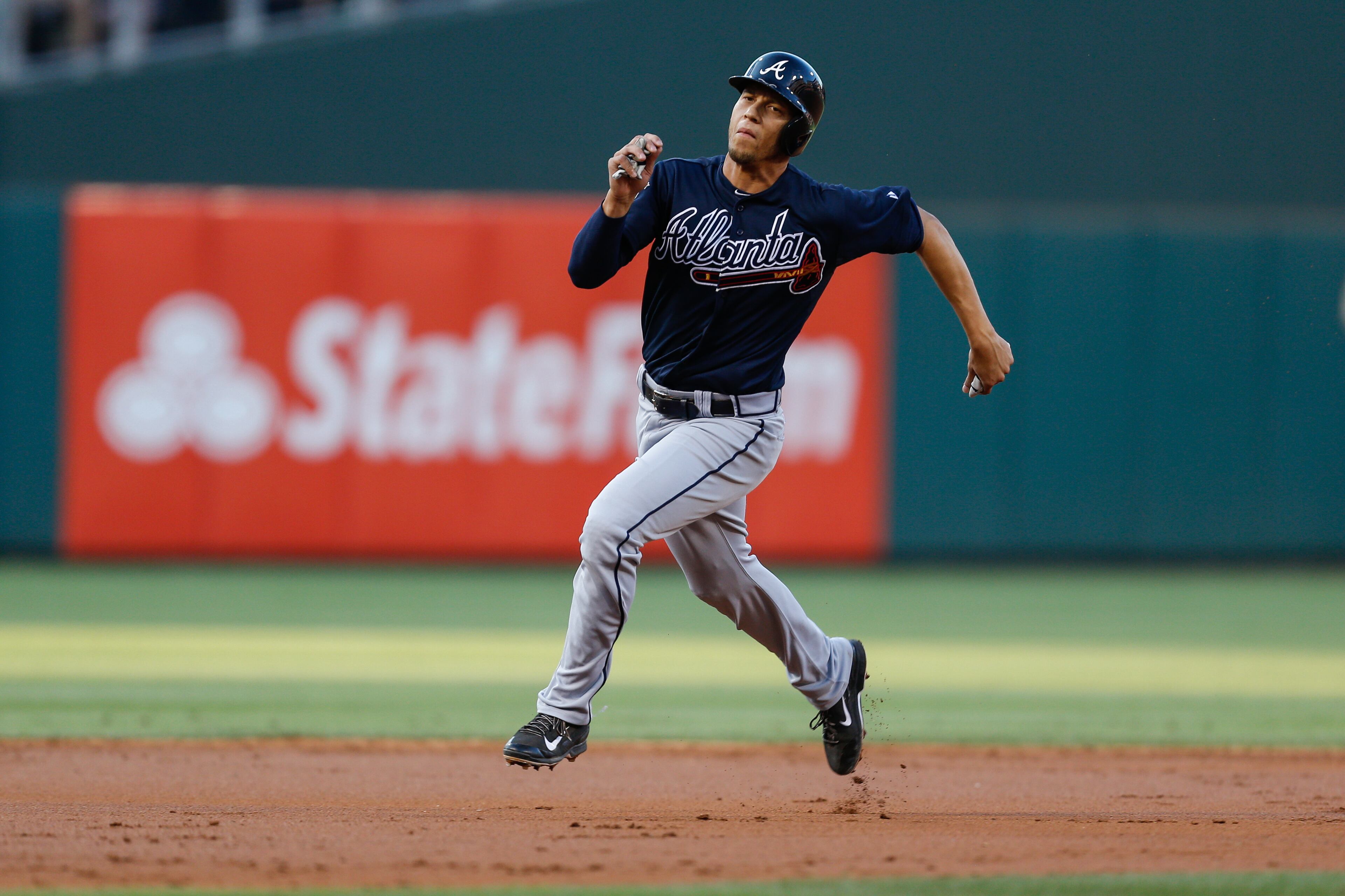 PHILADELPHIA, PA - JUNE 27: Andrelton Simmons #19 of the Atlanta Braves advances to third before scoring a run in the second inning of the game against the Philadelphia Phillies at Citizens Bank Park on June 27, 2014 in Philadelphia, Pennsylvania. (Photo by Brian Garfinkel/Getty Images)