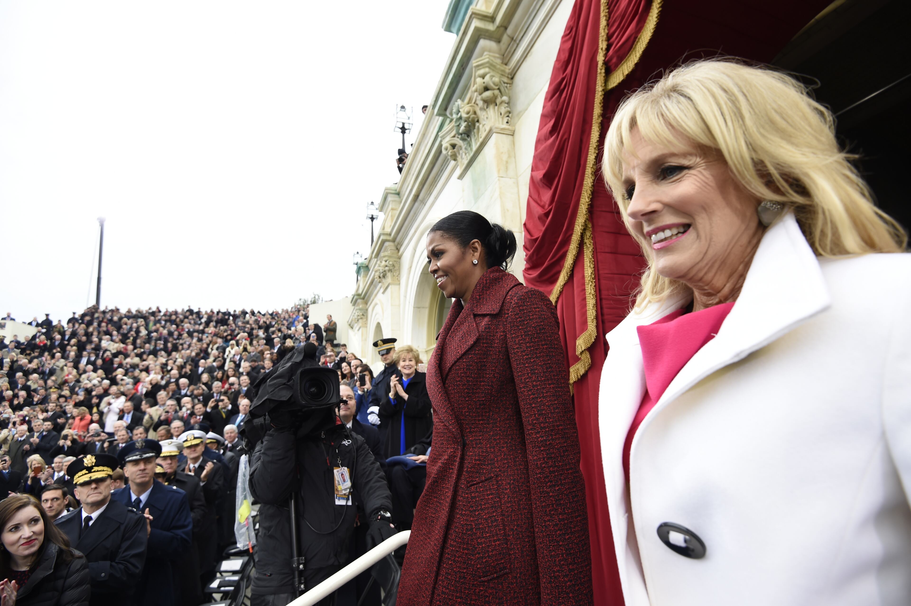 Michelle Obama andJill Biden at the 2017 inaugural ceremonies for Donald J. Trump. (Photo by Saul Loeb - Pool/Getty Images)