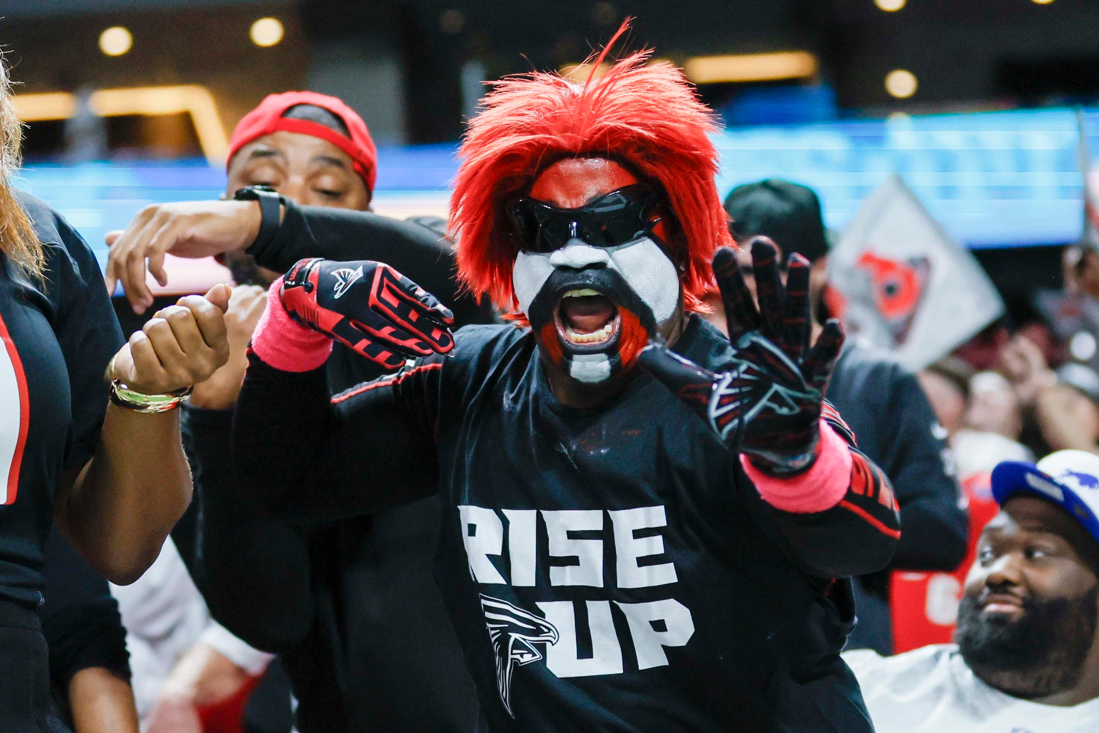 Atlanta Falcons fan reacts after they score a a field goal during the second half of an NFL football game against the Buffalo Bills at Mercedes-Benz Stadium in Atlanta on Monday, October 13, 2025.
(Miguel Martinez/ AJC)