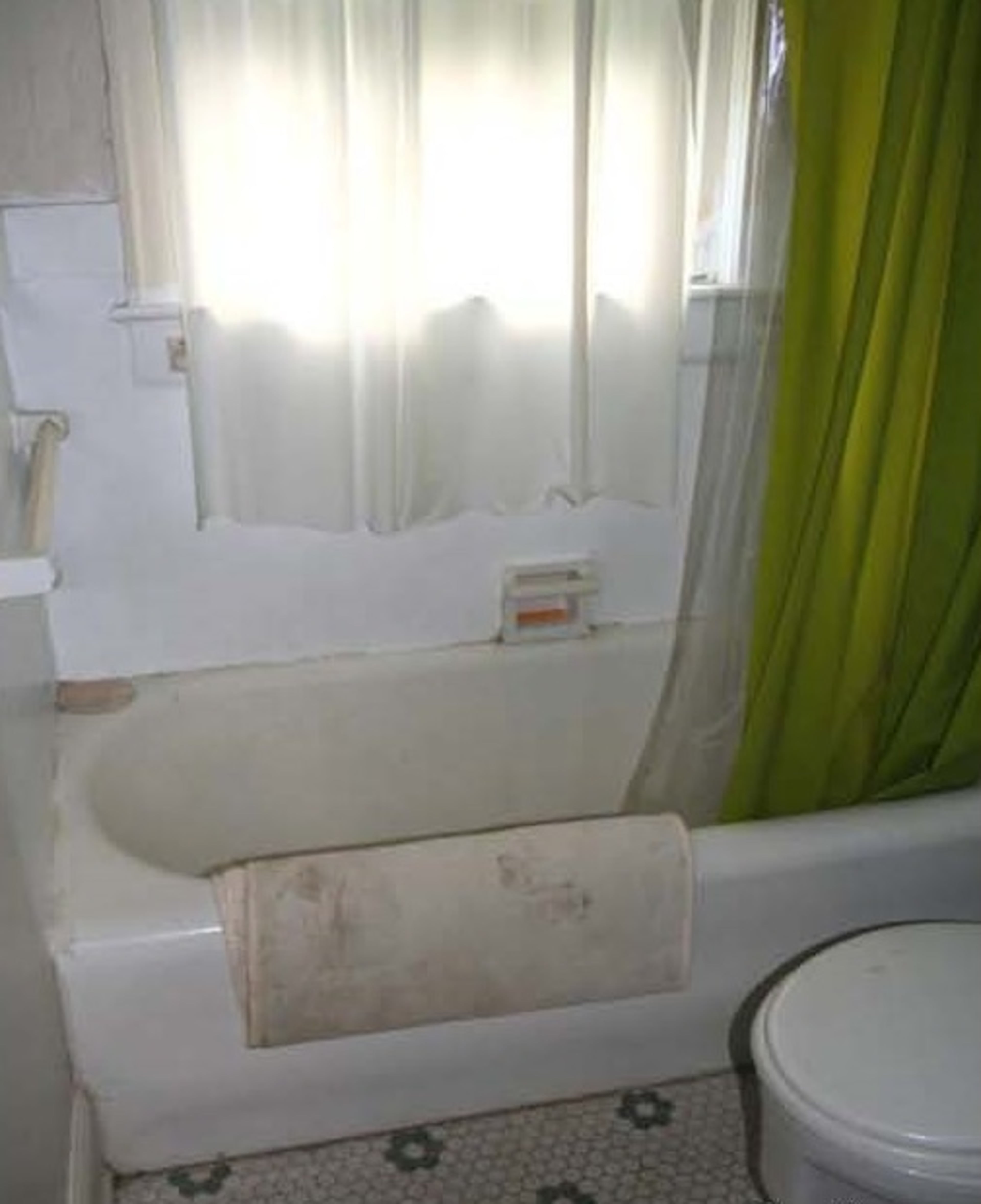 Before O'Brien's hard work the downstairs powder room was cramped, dark and dingy.