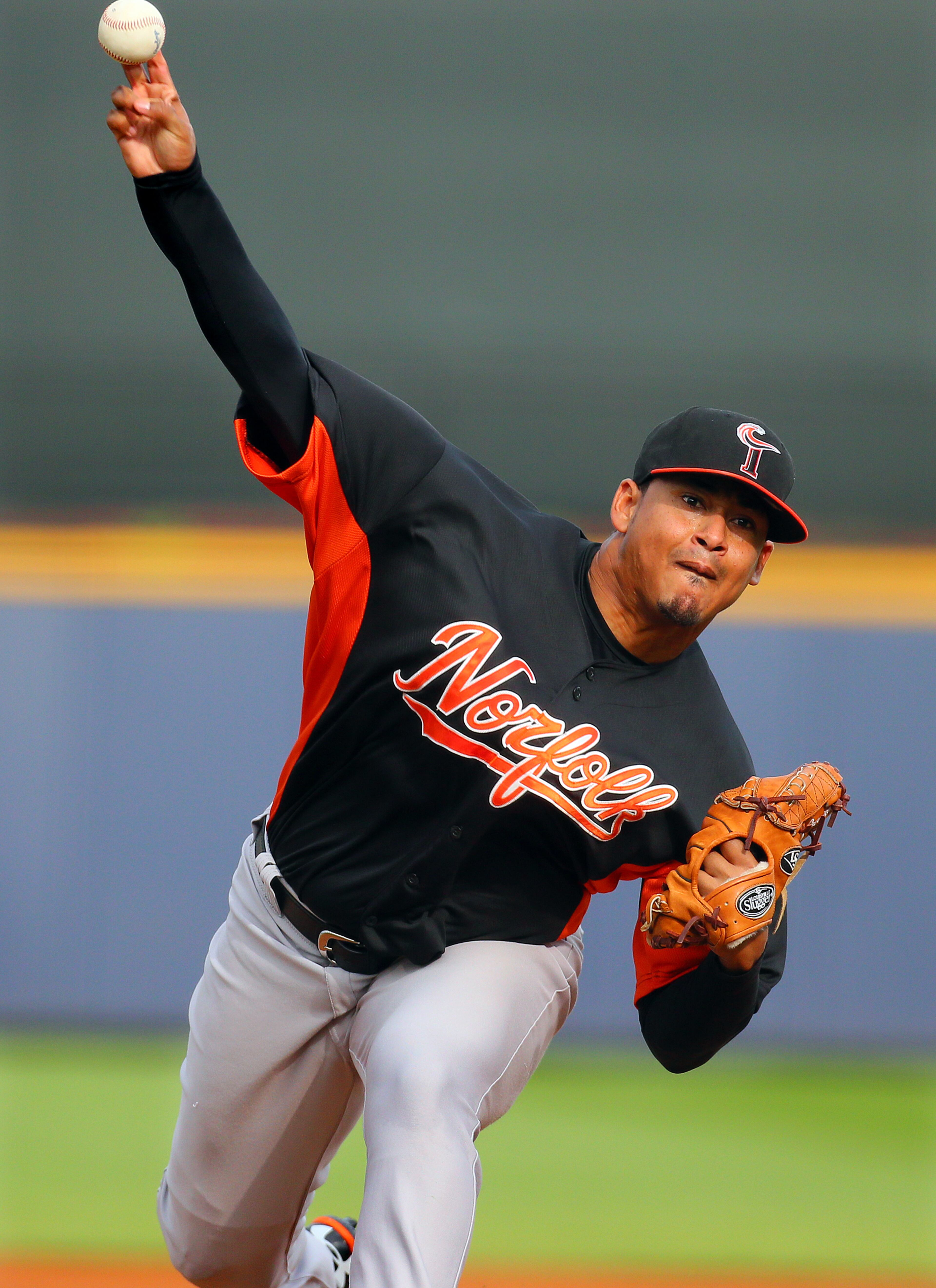 070913 LAWRENCEVILLE: Former Braves pitcher Jair Jurrjens, now with the Norforlk Tides, delivers a pitch against the Gwinnett Braves during the first inning at Coolray Field on Tuesday, July 9, 2013, in Lawrenceville. CURTIS COMPTON / CCOMPTON@AJC.COM