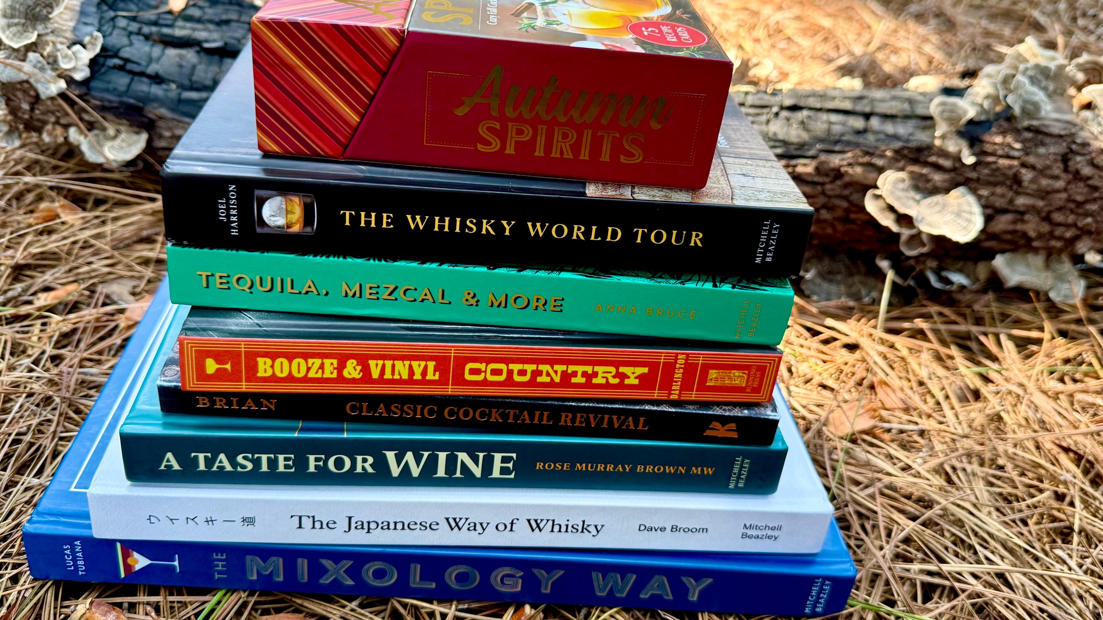 Fall 2025 offers exciting new drink books on whisky, wine and mixing classic cocktails at home. (Angela Hansberger for the AJC)