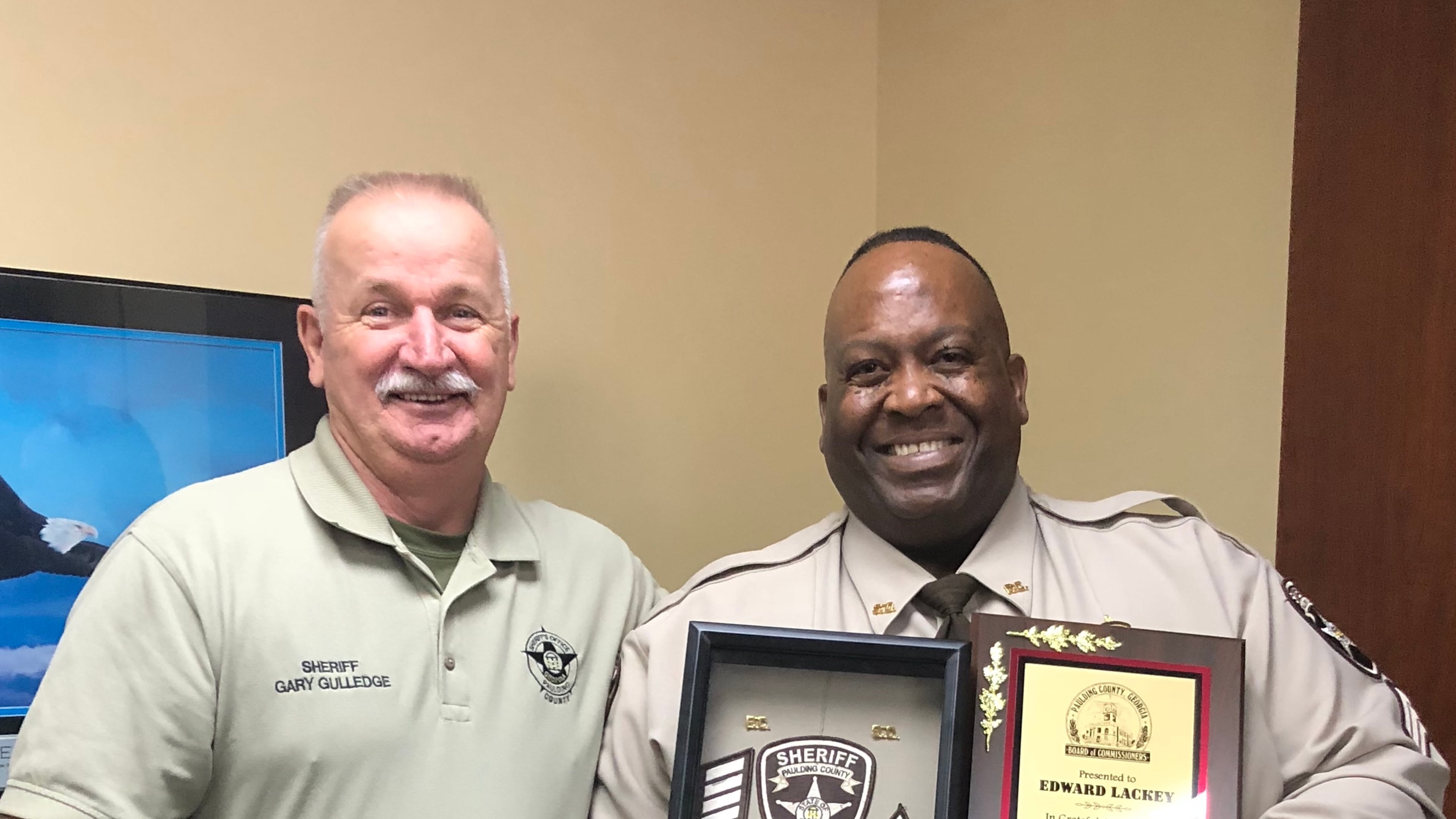 Paulding County’s Sheriff Gary Gulledge (left) honored Sergeant Ed Lackey of the Paulding County Sheriff’s Office during his retirement reception January 19. Sergeant Lackey’s law enforcement career has spanned over 29 years.