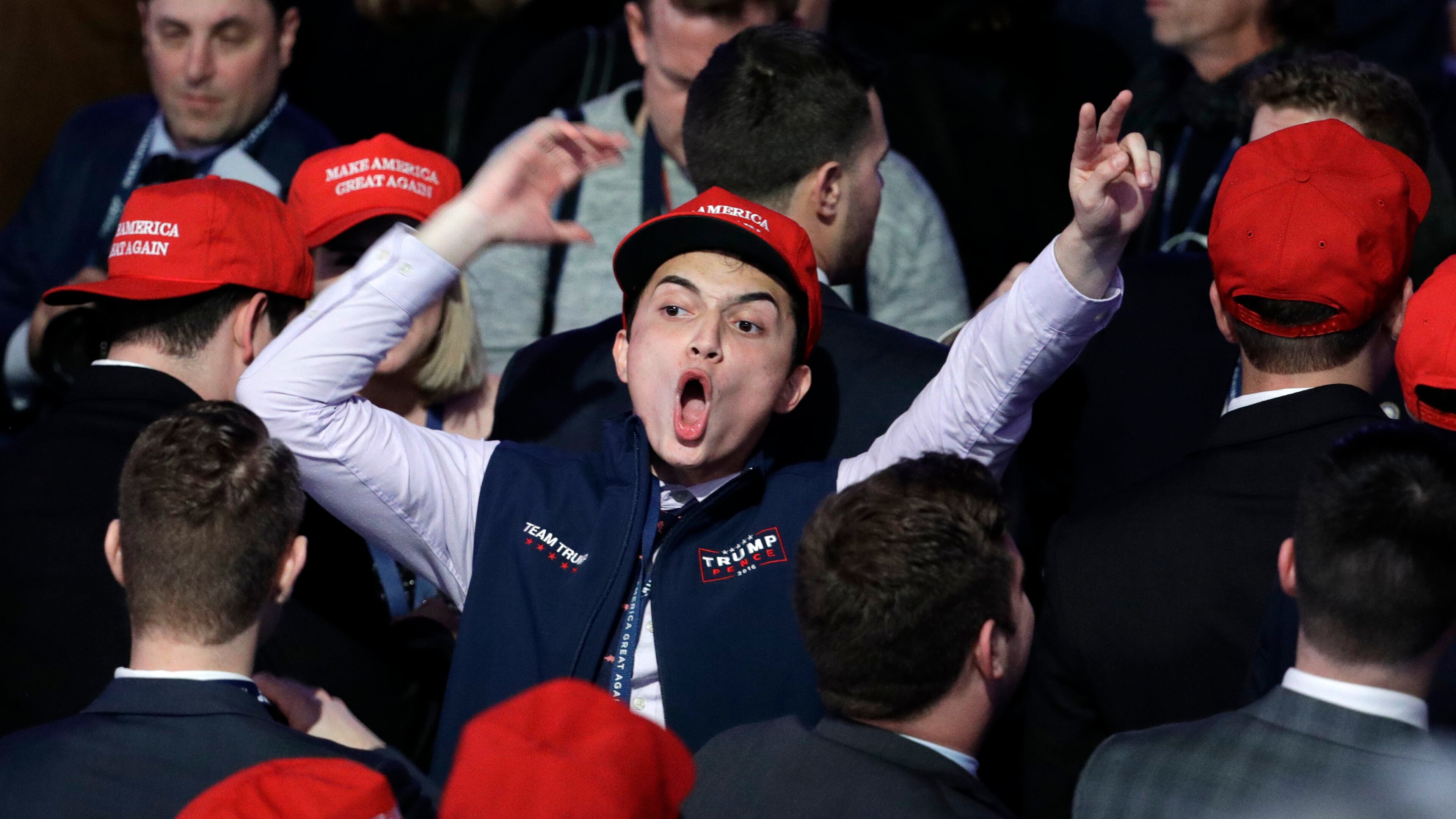 Supporters of Republican presidential candidate Donald Trump react as they watch the election results during Trump's election night rally, Tuesday, Nov. 8, 2016, in New York. (AP Photo/John Locher)