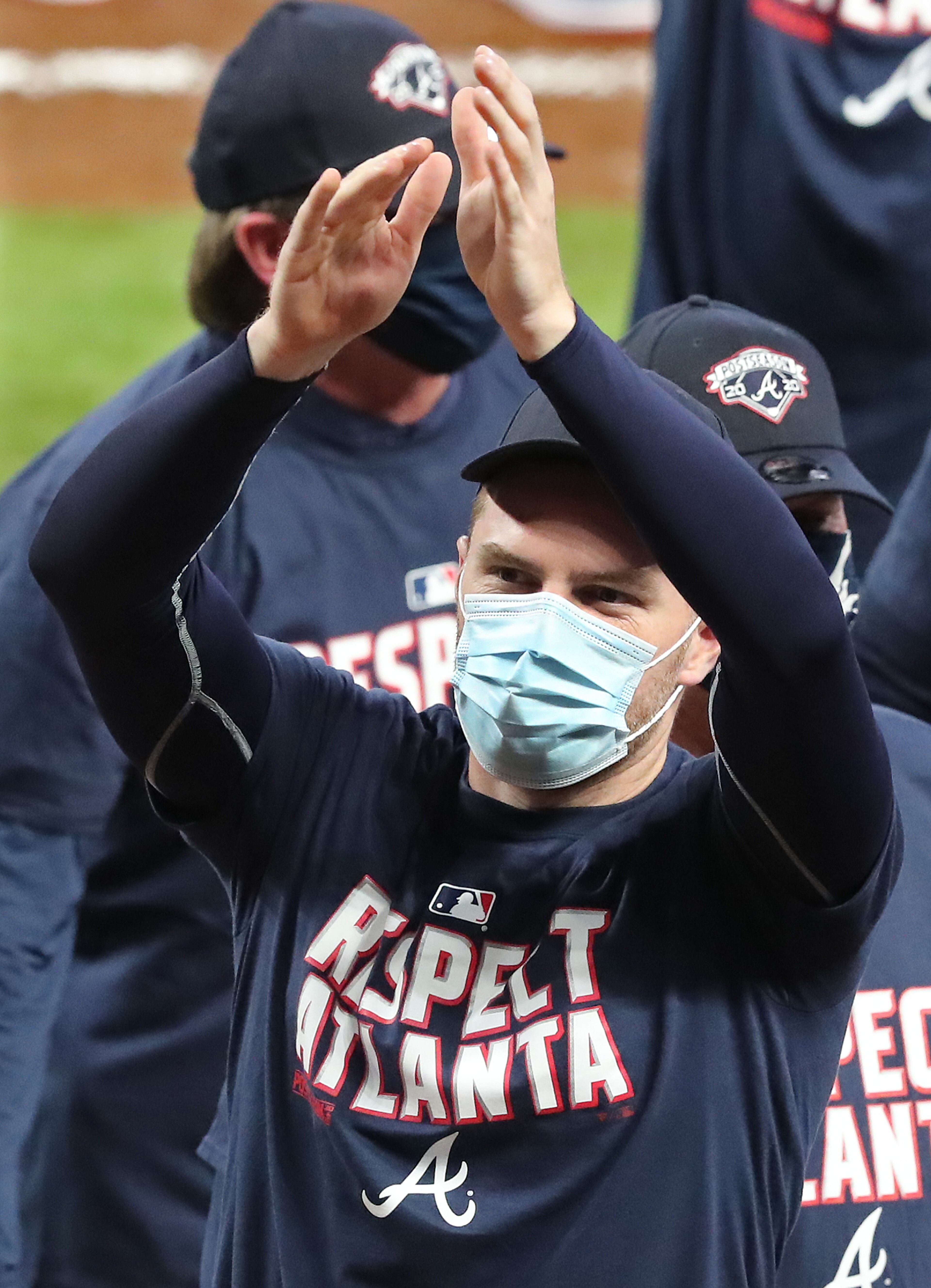 Braves' Freddie Freeman celebrates clinching the third consecutive National League East championship title with a 11-1 victory over the Miami Marlins in a MLB baseball game on Tuesday, Sept. 22, 2020 in Atlanta. “Curtis Compton / Curtis.Compton@ajc.com”
