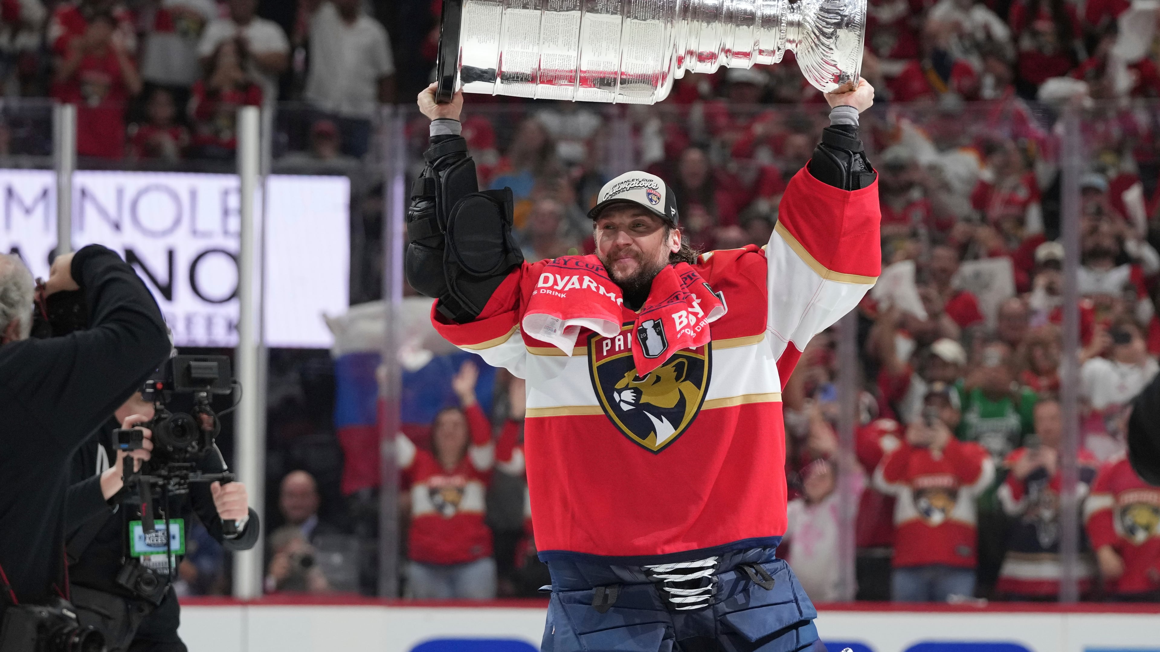 FILE - Florida Panthers goaltender Sergei Bobrovsky lifts the Stanley Cup after defeating the Edmonton Oilers in Game 6 of the NHL hockey Stanley Cup Final June 17, 2025, in Sunrise, Fla. (AP Photo/Lynne Sladky, File)