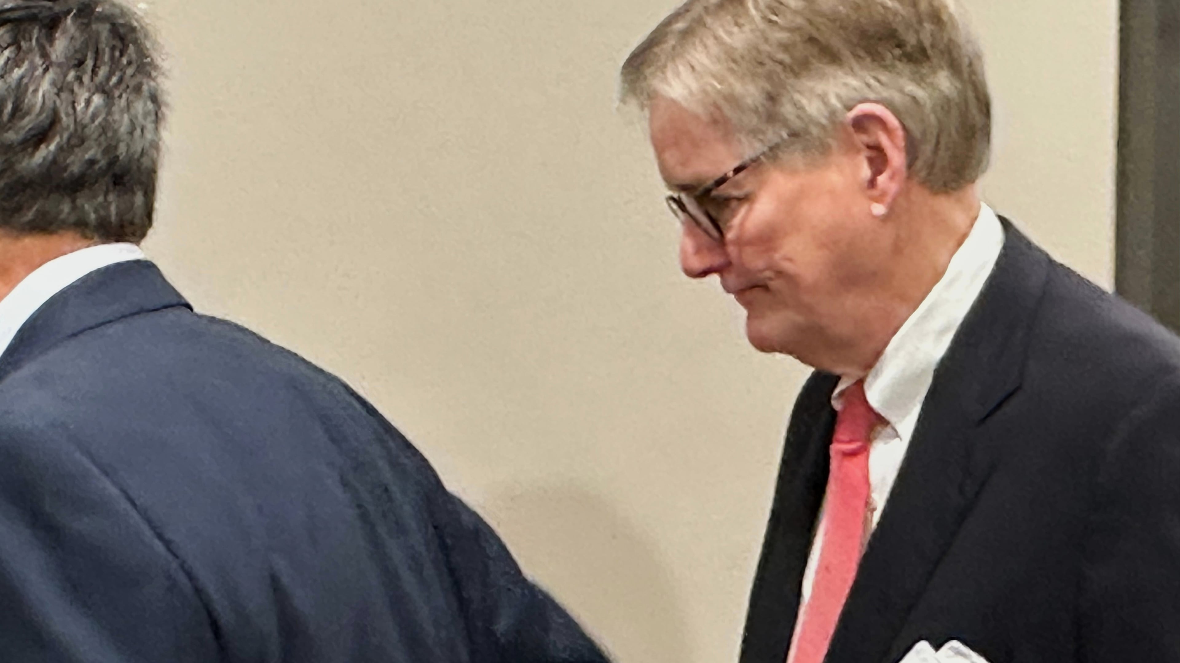 FILE - Edwin Brant Frost IV, a former principal of First Liberty Building and Loan, waits for an elevator, Dec. 22, 2025, in Atlanta. (AP Photo/Jeff Amy, File)
