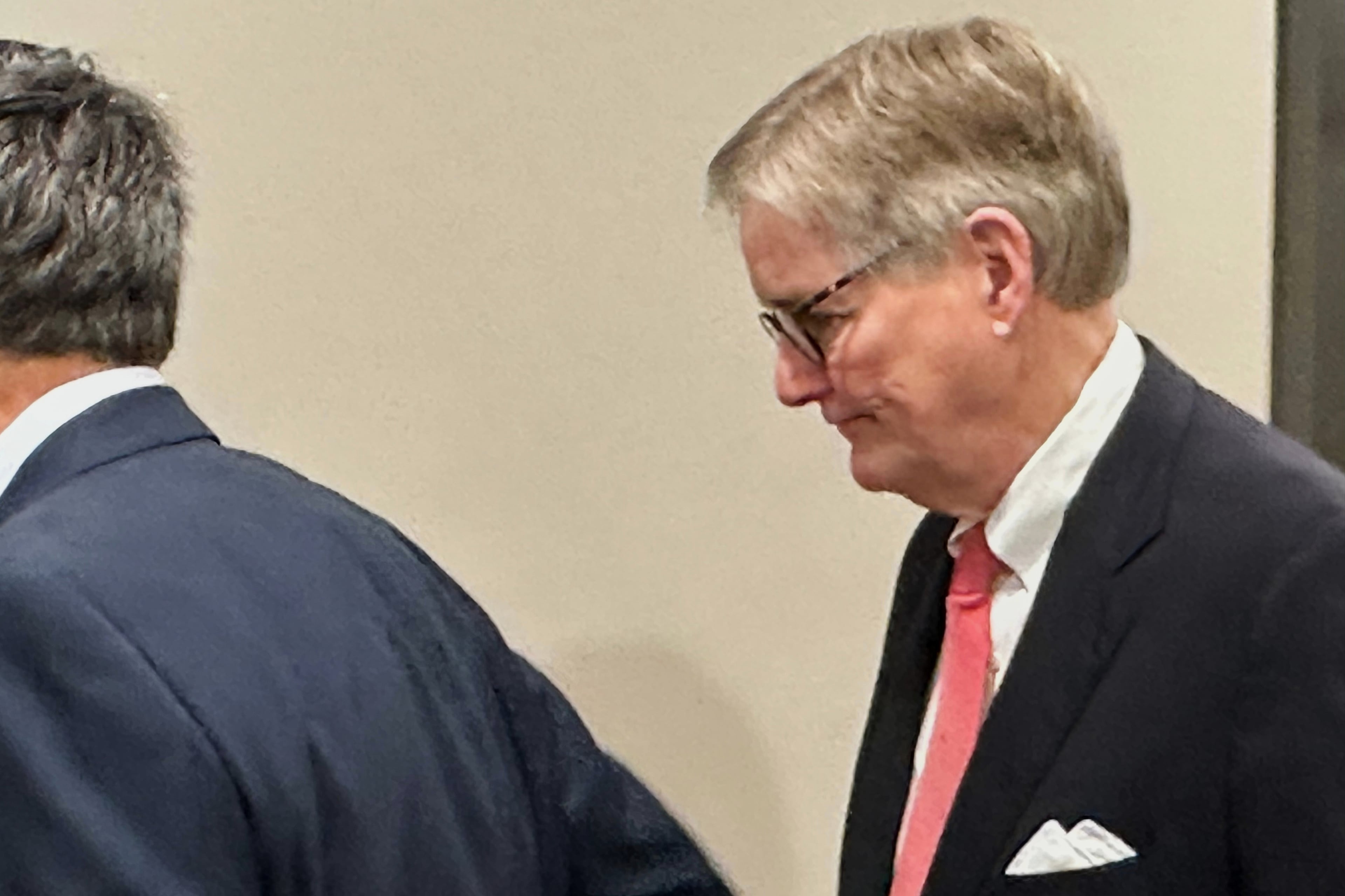 Brant Frost IV, a former principal of First Liberty Building and Loan, waits for an elevator, Dec. 22, 2025, in Atlanta. He fleeced more than 300 victims of at least $76 million, Judge May said. (Jeff Amy/AP)