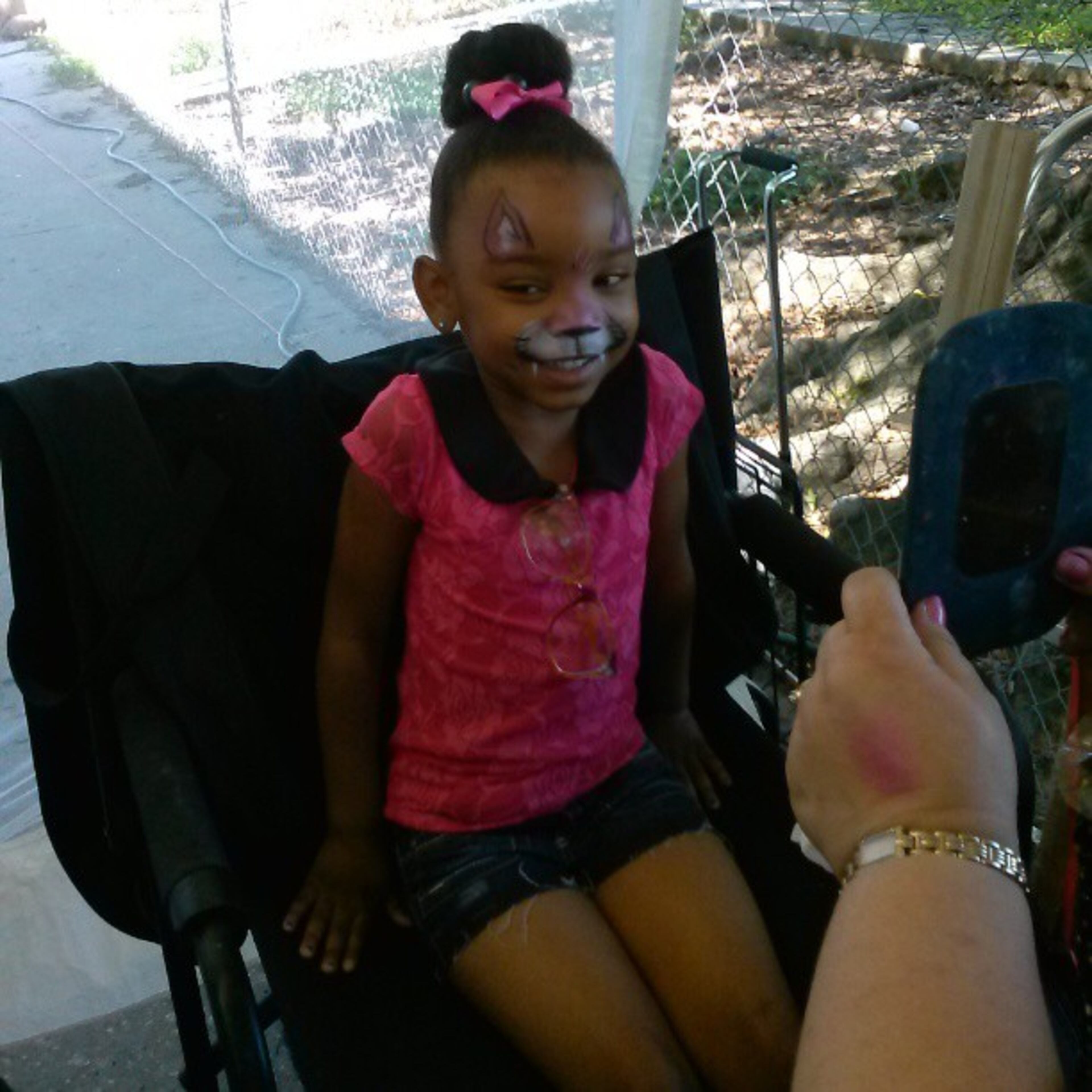 Face paint action at da #sweetauburnfest -- @reddbeam