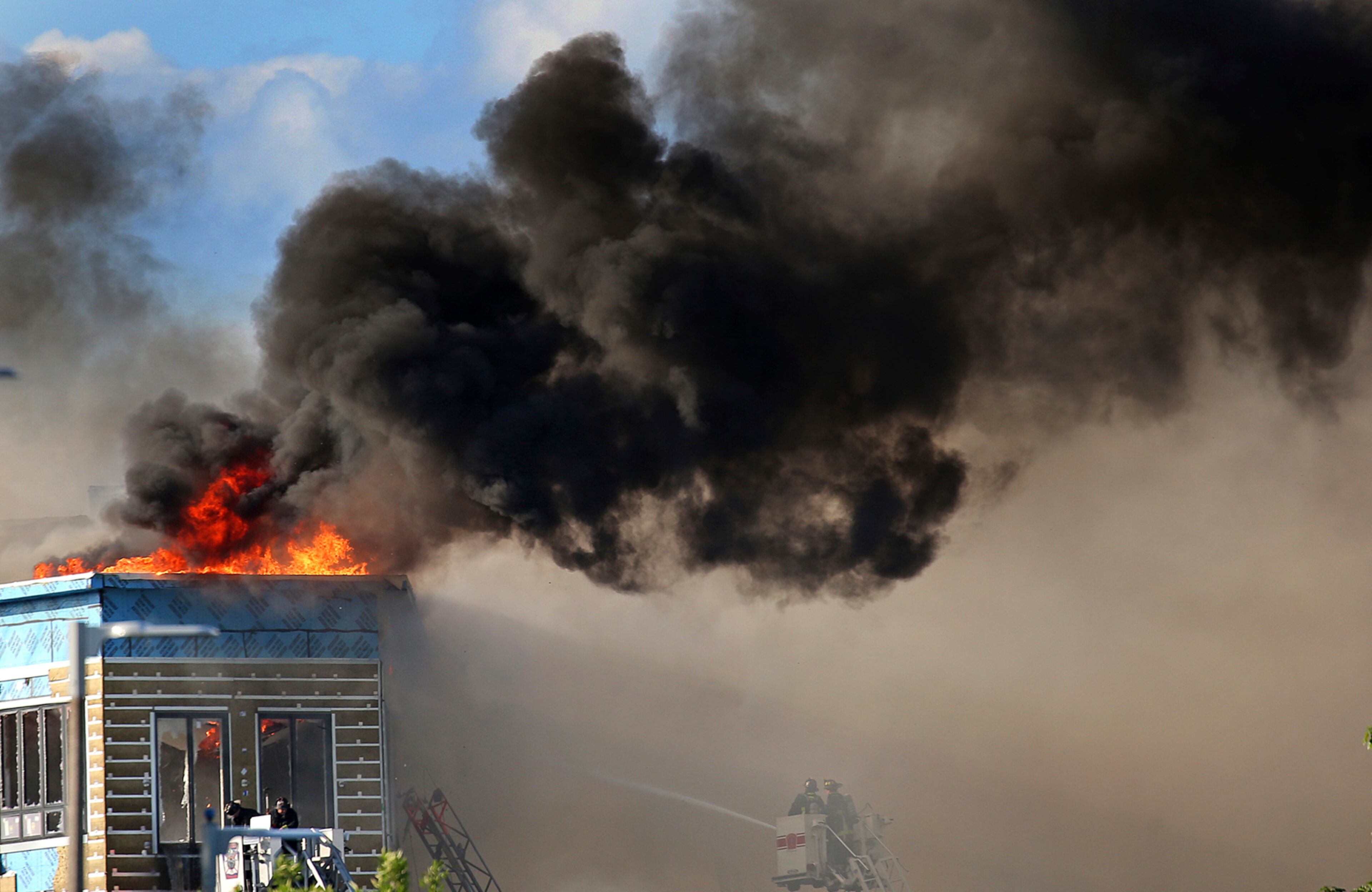 A multi-alarm fire destroyed a $45 million apartment building Wednesday, June 28, 2017, in Dorchester, Boston that was in its final stages of construction.
Officials say the building was constructed all within code, and the cause of the fire is still under investigation. (David L Ryan//The Boston Globe via AP)