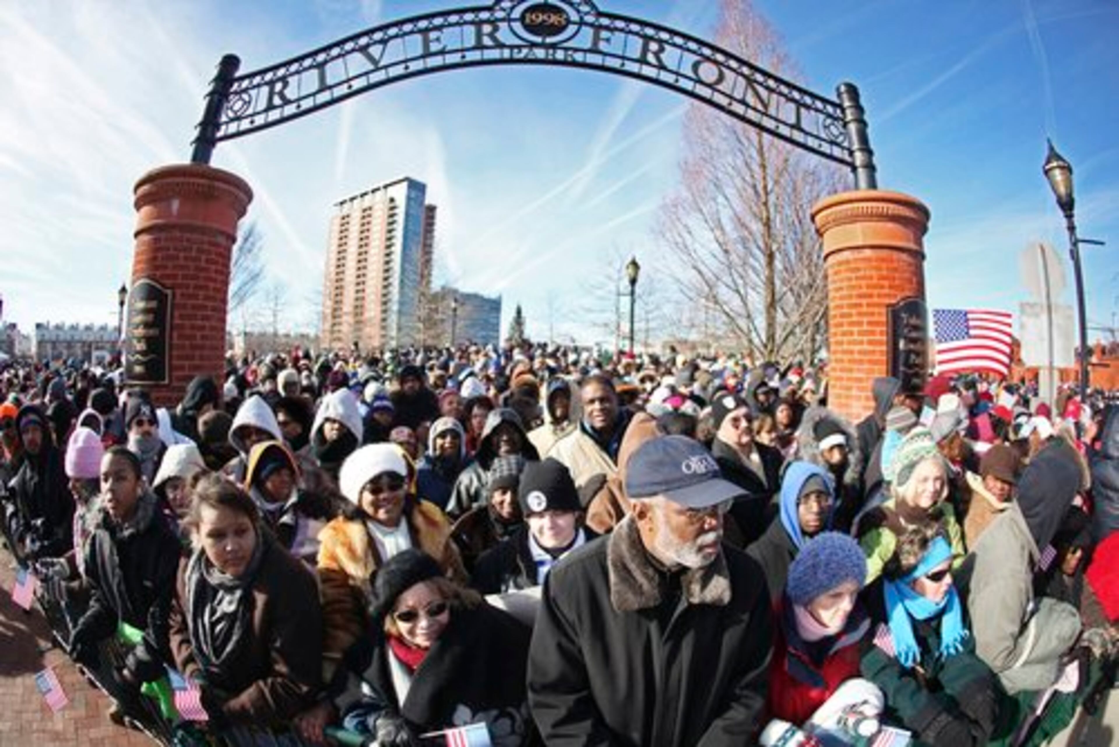 Scores of people wait in Wilmington, Del., for the Obama inaugural train to arrive Saturday to pick up VP-elect Joe Biden before departing for Baltimore and Washington.