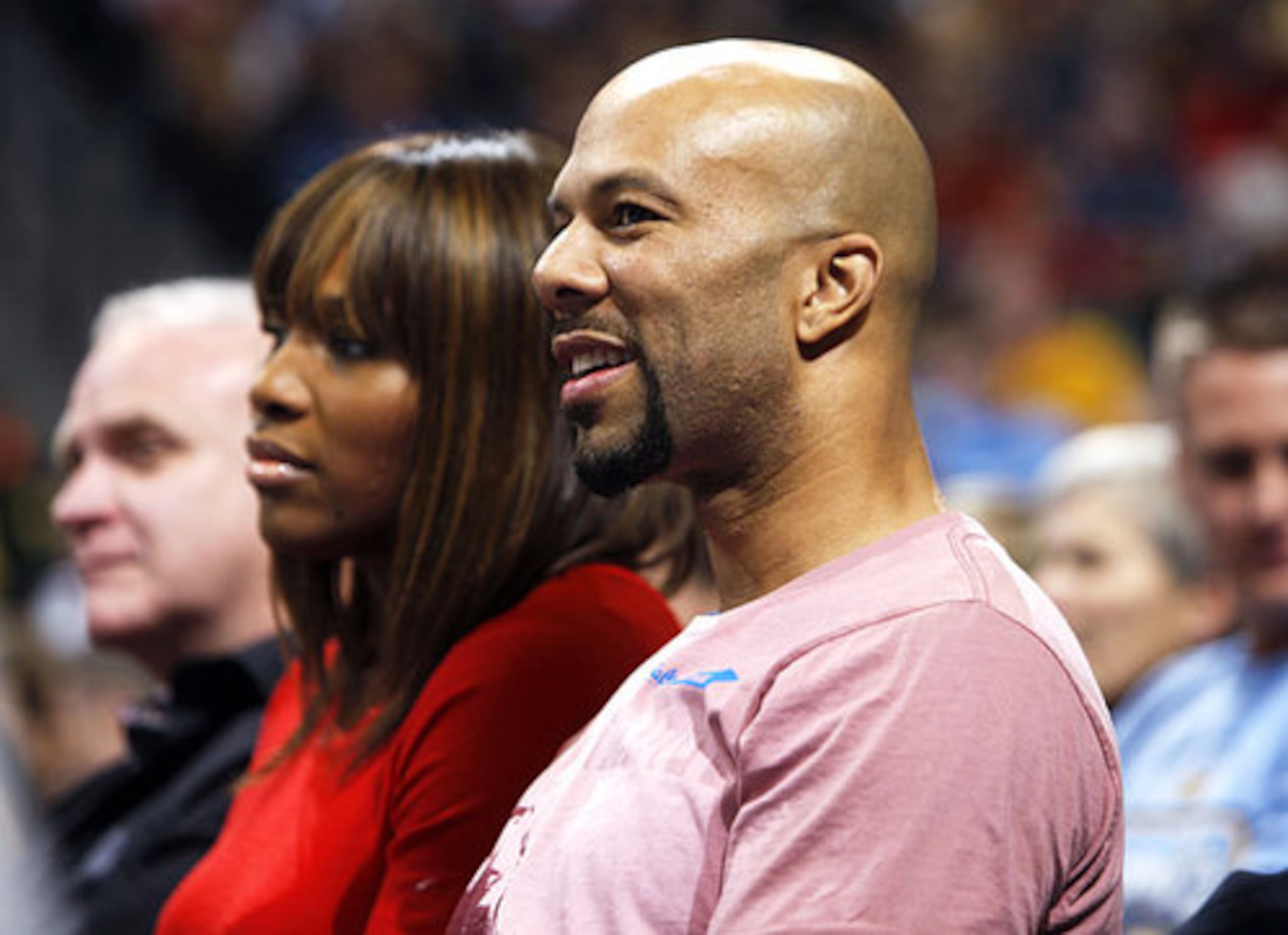Rapper Common (right) and tennis star Serena Williams in court side seats to watch the Denver Nuggets' 112-93 victory over the Chicago Bulls in an NBA basketball game in Denver on Saturday, Nov. 21, 2009.