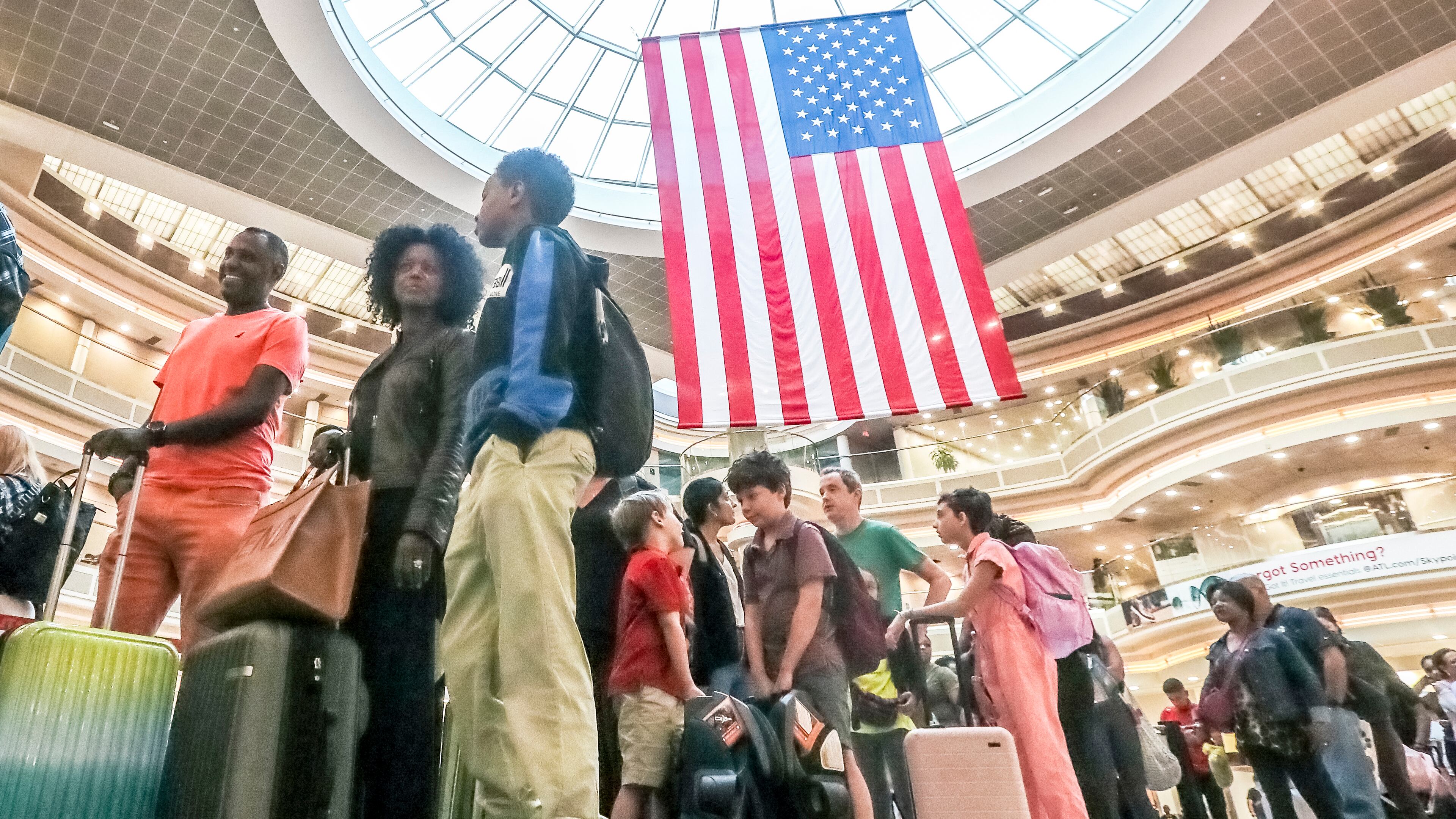June 29, 2023 Atlanta: Travelers came ready to fly on Friday, June 29, 2023 and was a busy day for security queues at Hartsfield-Jackson International Airport. More than 103,000 departing passengers were expected to pass through TSA checkpoints surpassing the record set on the Monday after the Super Bowl in Atlanta in 2019, said Robert Spinden, TSA’s federal security director in Atlanta. The July 4 holiday period will bring more travelers not just to airports, but also on the highways. AAA said it expects a record 1.6 million people in Georgia to travel for the period running from June 30 through July 4, most of them going by car. Travelers should “expect to see congested roads, busy hotels, and long lines at airports and attractions,” said Debbie Haas, AAA’s vice president of travel, in a written statement. Nationally, the auto club expects 43.2 million people will take road trips and a record 4.17 million people will fly for Independence Day travel. Heavy crowds at the world’s busiest airport throughout the holiday period from Thursday through July 6 will mean long lines and wait times at airport security checkpoints during peak times. Most planes will be full or nearly full. The busiest days are expected to be Thursday and Friday. Total traffic including connecting passengers at the Atlanta airport, is expected to total more than 350,000 on Thursday and nearly 370,000 on Friday. (John Spink / John.Spink@ajc.com)