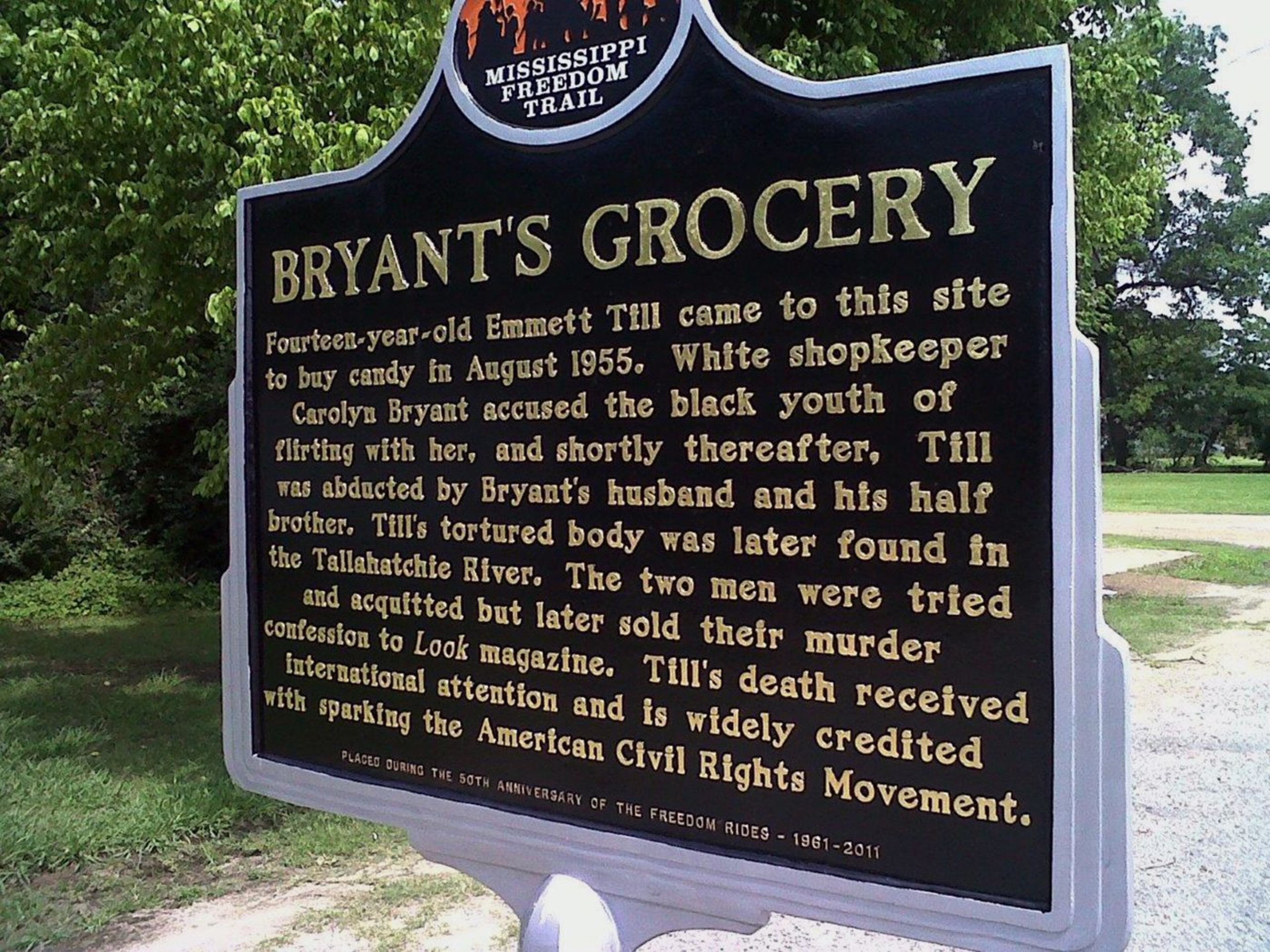 This June 2012 photo shows a historic sign commemorating the lynching of Emmett Till in Money, Mississippi. After the opposite side of the sign, not shown, was vandalized, officials had it repaired.