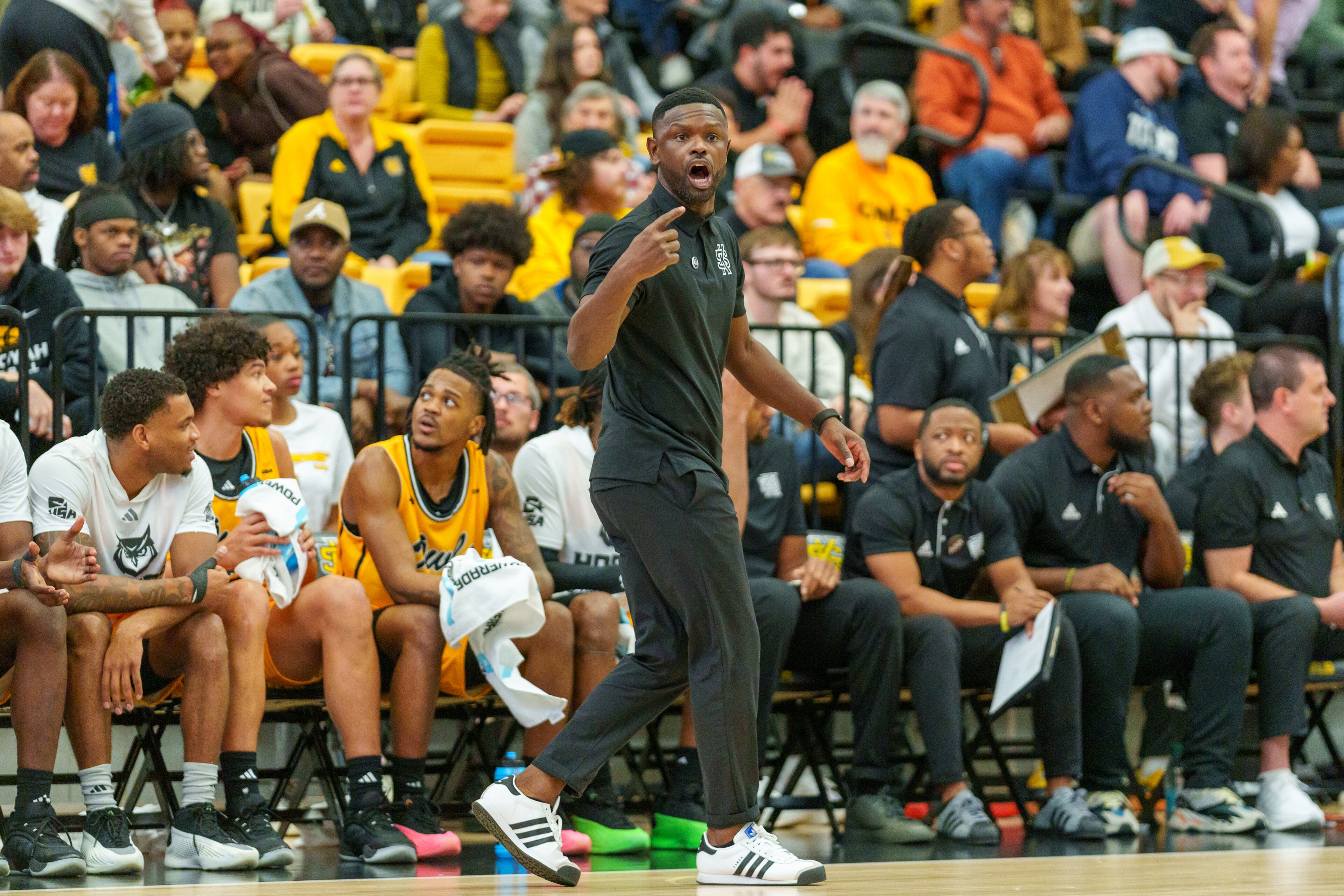 Kennesaw State head coach calls a play during the first half of an NCAA basketball game against Rutgers on Sunday, Nov. 24, 2024, in Kennesaw, at the KSU Convocation Center. (Atlanta Journal-Constitution/Jason Allen)