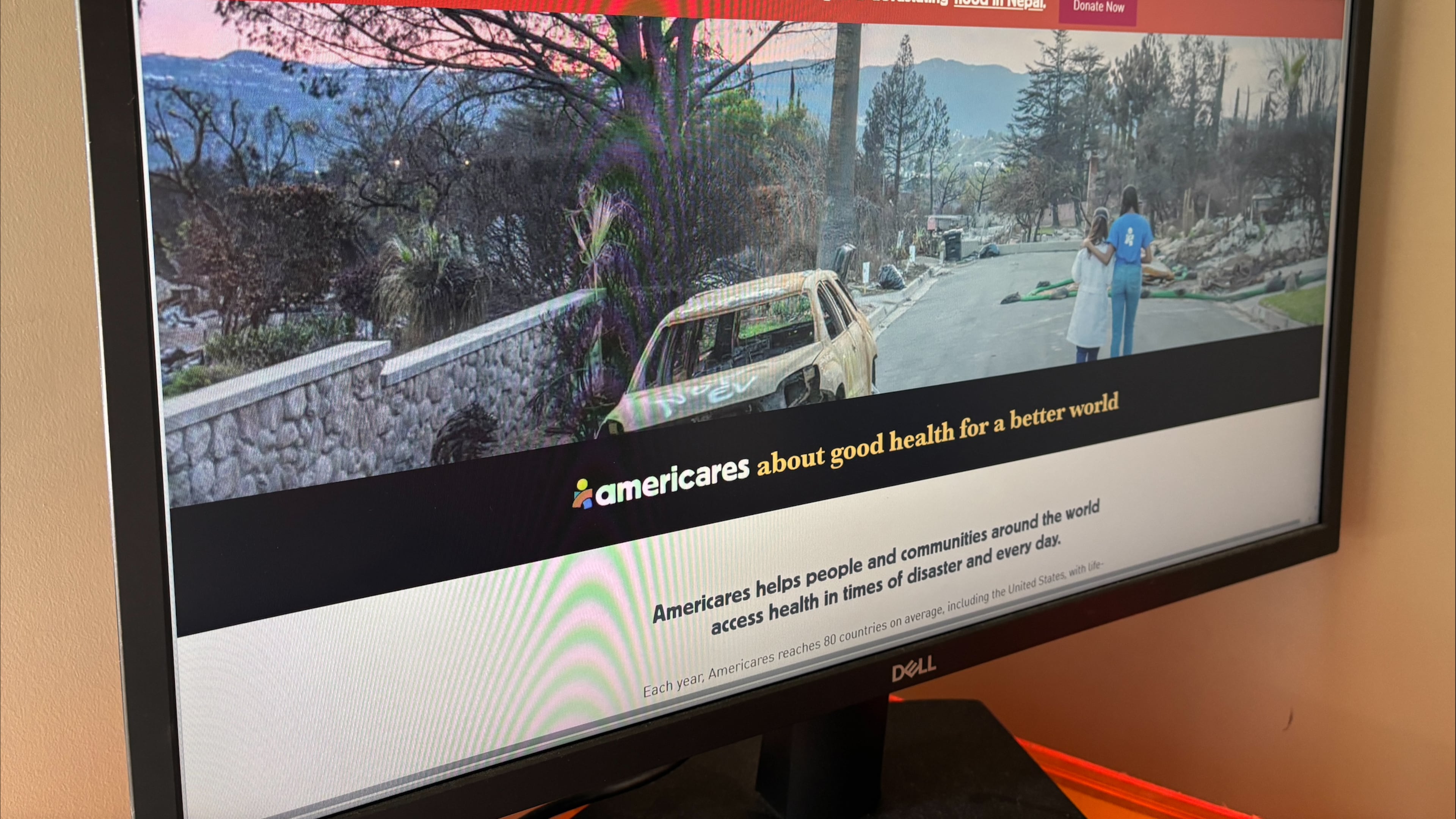 Americares' website sits open on a computer monitor in New York on Tuesday, Sept. 8, 2026. (AP Photo/James Pollard)