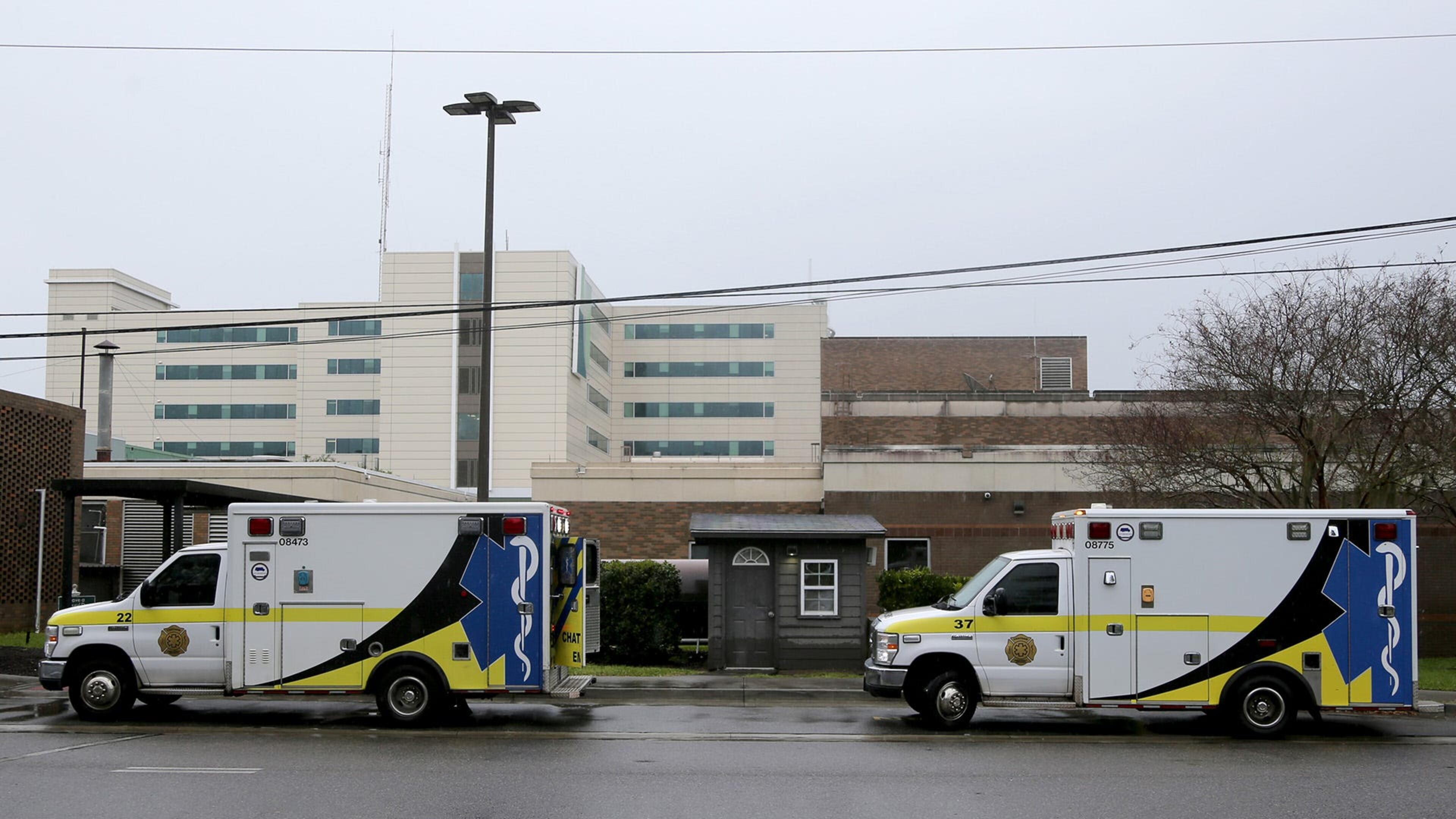 Two ambulances from Chatham EMS sit outside a temproary ambulance entrance at St. Joseph's Hospital on Friday March 10, 2023.