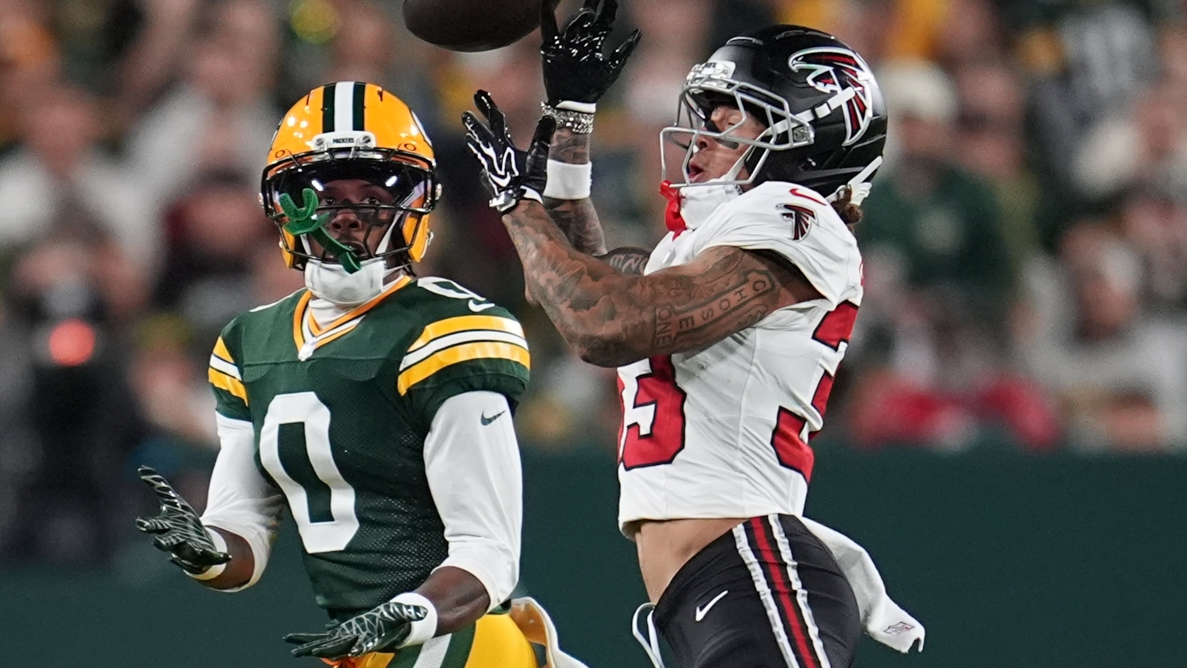 The Falcons' Billy Bowman Jr. (right) breaks up a pass intended for the Packers' Matthew Golden on Thursday, Sept. 24, 2026, in Green Bay, Wis. (Abbie Parr/AP)