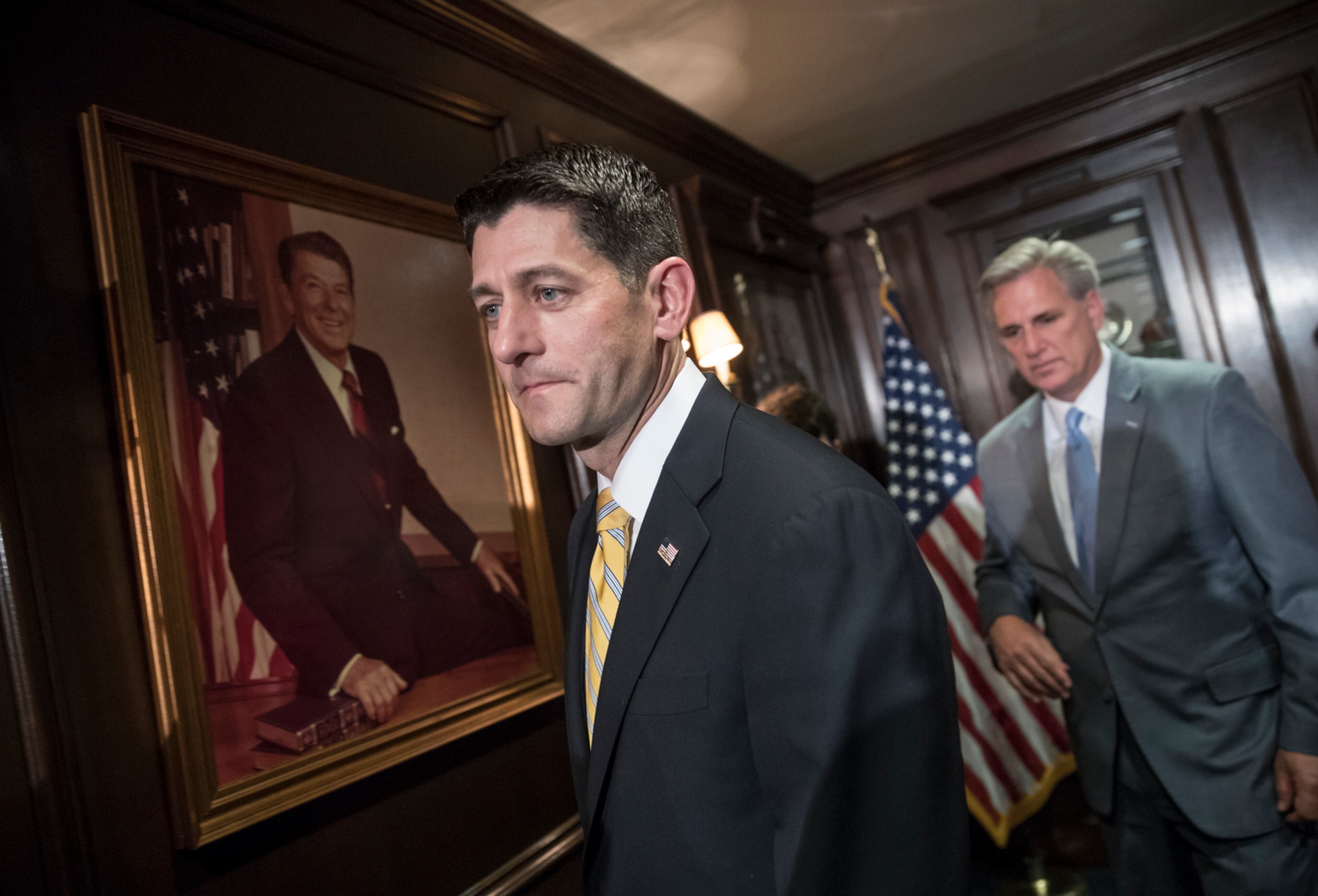 House Speaker Paul Ryan of Wis., followed by House Majority Leader Kevin McCarthy of Calif., finishes a news conference at the Republican National Committee Headquarters in Washington, Wednesday, May 17, 2017. Ryan said Congress "can't deal with speculation and innuendo" and must gather all relevant information before "rushing to judgment" on President Donald Trump's firing of FBI Director James Comey. (AP Photo/J. Scott Applewhite)