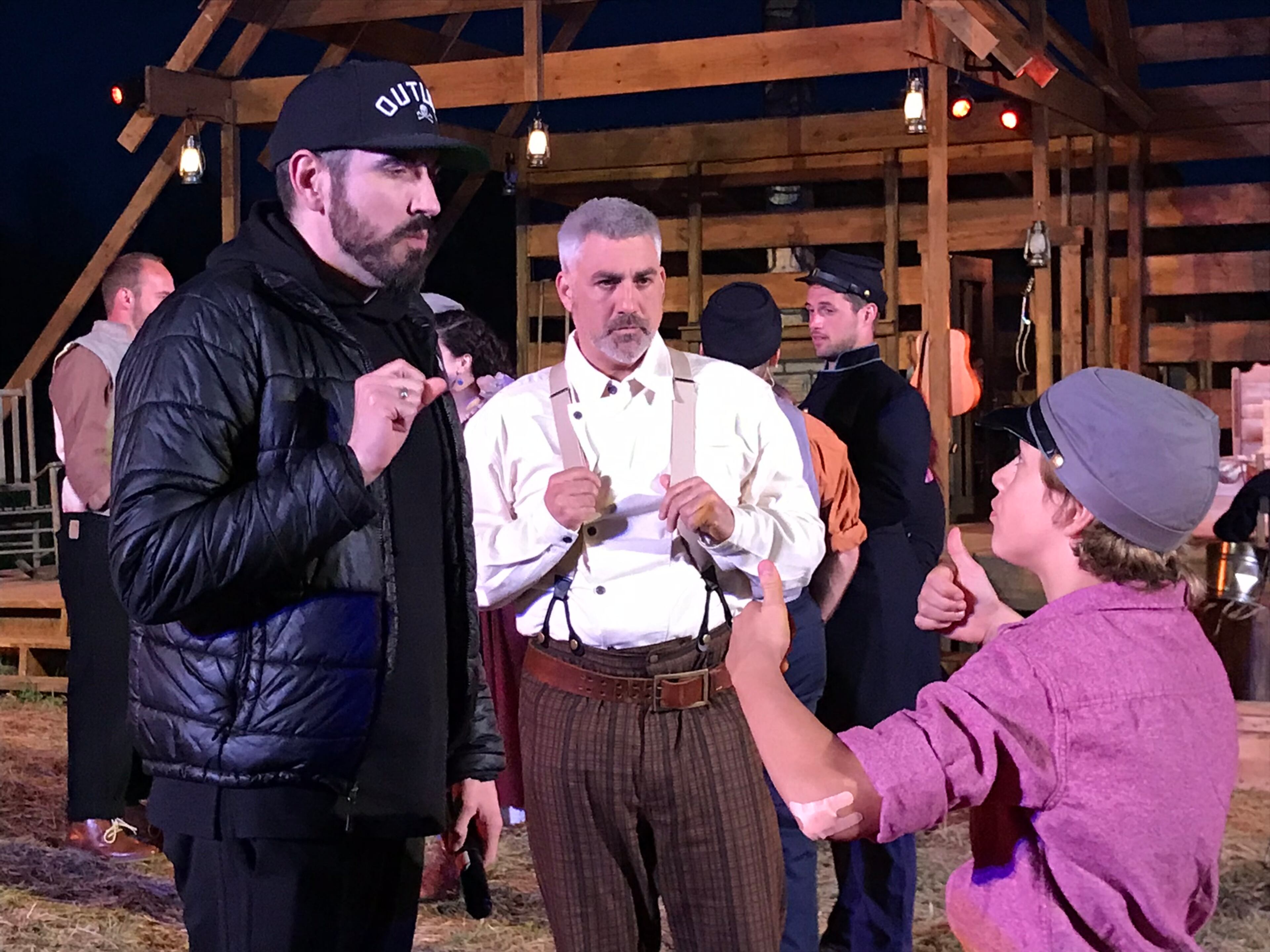 Serenbe Playhouse founder and artistic director Brian Clowdus gives direction to Taylor Hicks (center) and Pilot Bunch (right) before the dress rehearsal of "Shenandoah" on March 12, 2019. RODNEY HO / RHO@AJC.COM