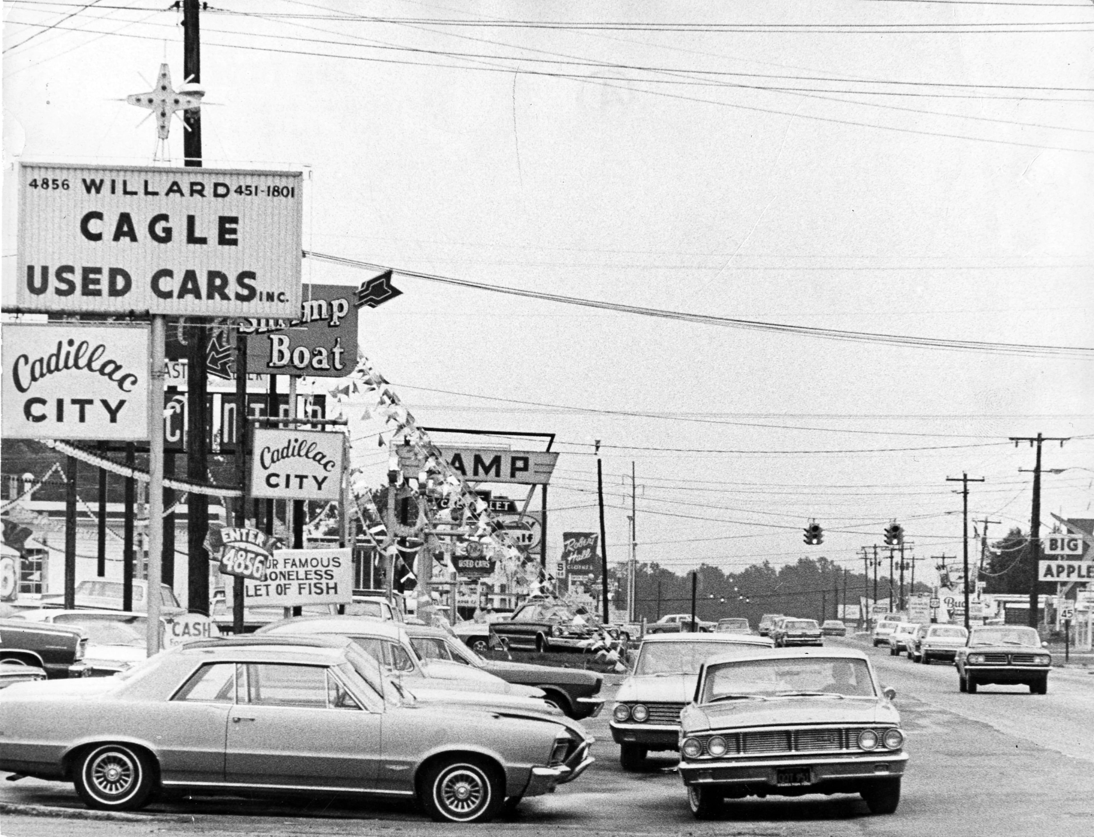 Expanding commercial areas blossom with signs along Buford Highway in Chamblee in 1967