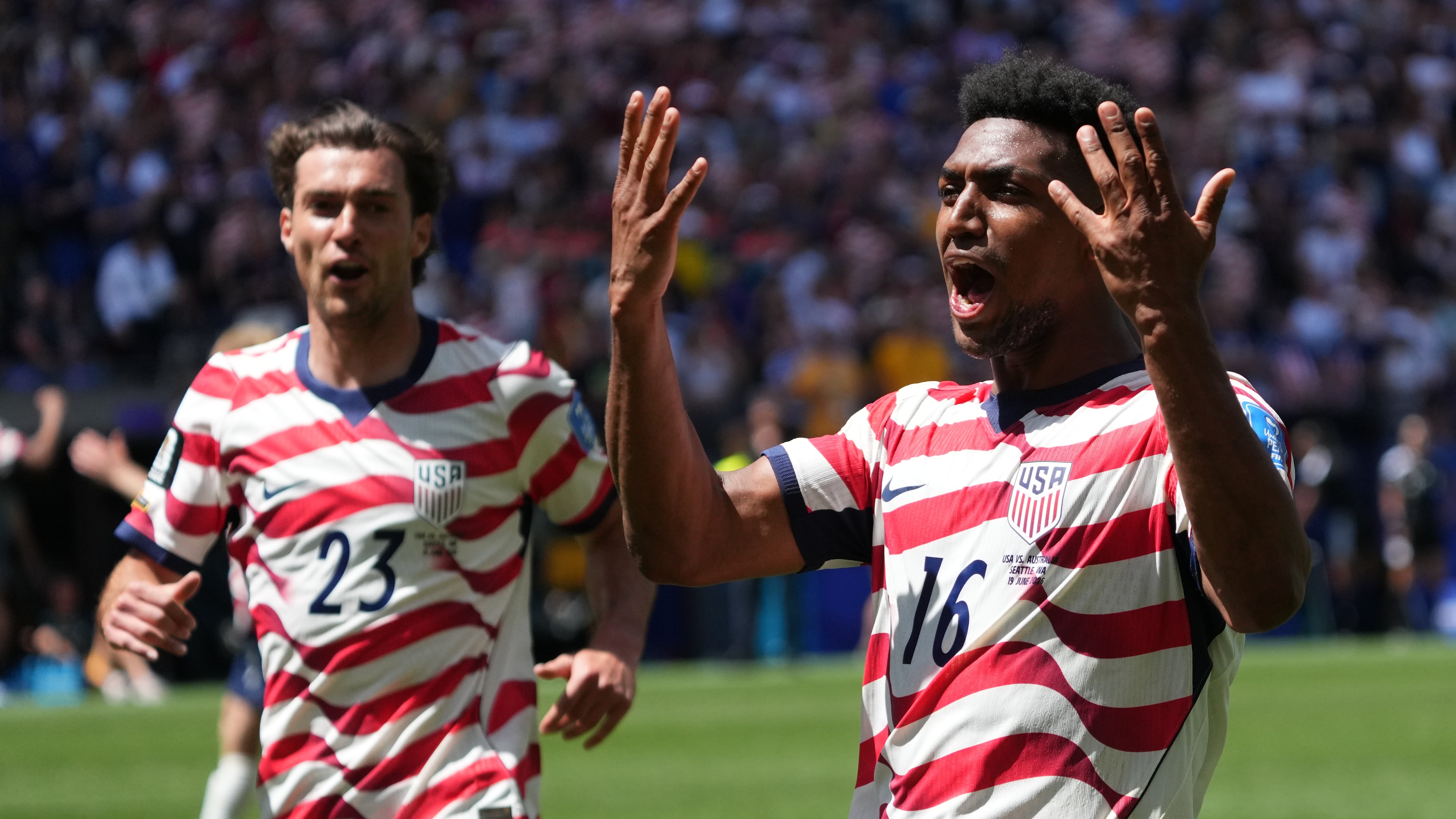 United States' Joe Scally (23) and Alex Freeman (16) react after the World Cup Group D soccer match between the United States and Australia in Seattle, Friday, June 19, 2026. (AP Photo/Ted S. Warren)