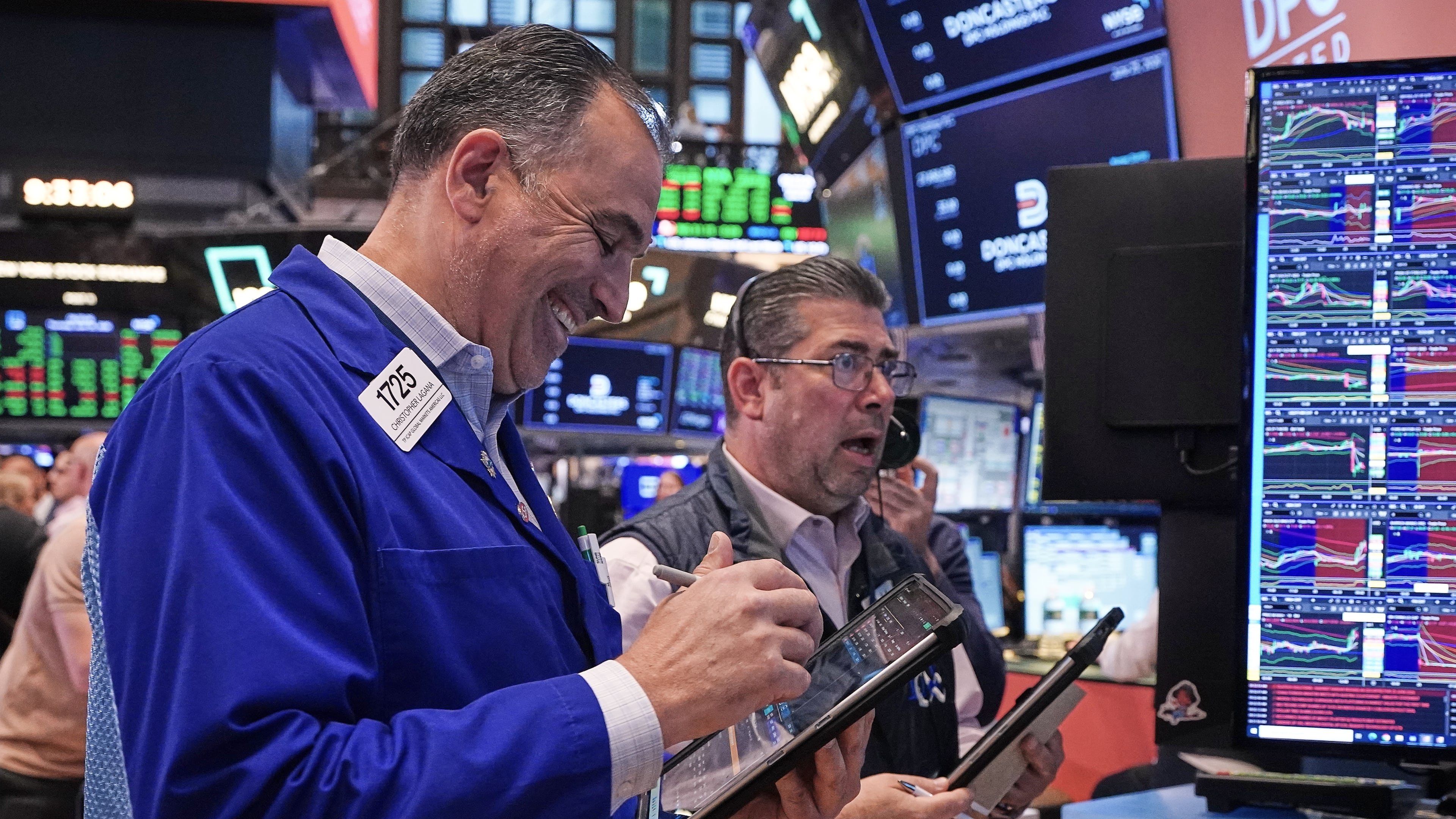 Traders Chris Lagana, left, and Michael Capolino work on the floor of the New York Stock Exchange, Thursday, June 25, 2026. (AP Photo/Richard Drew)