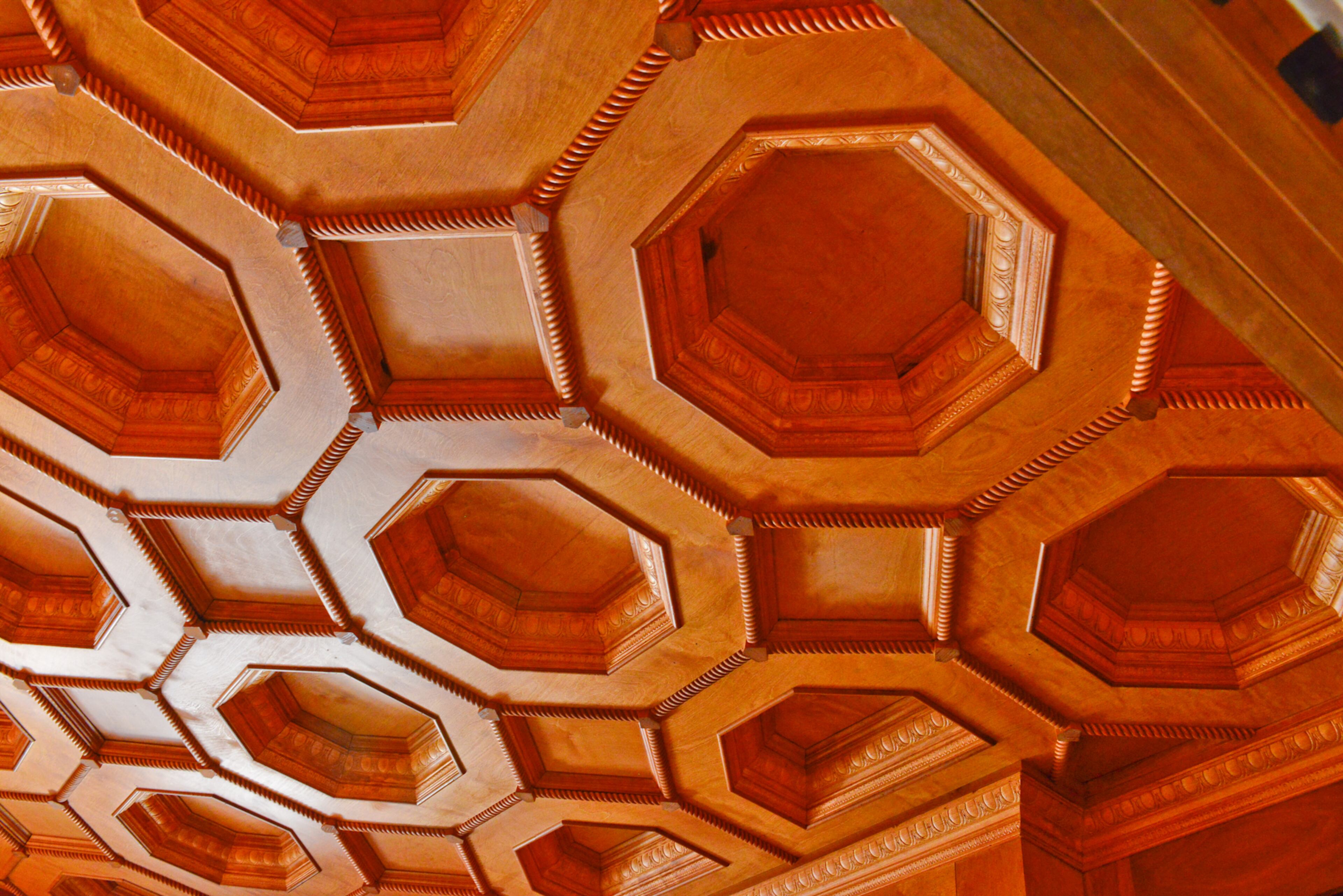 The elaborate honeycomb coffered ceiling in Jeffrey Bulvin's Vinings home exudes a classical Mediterranean vibe.
