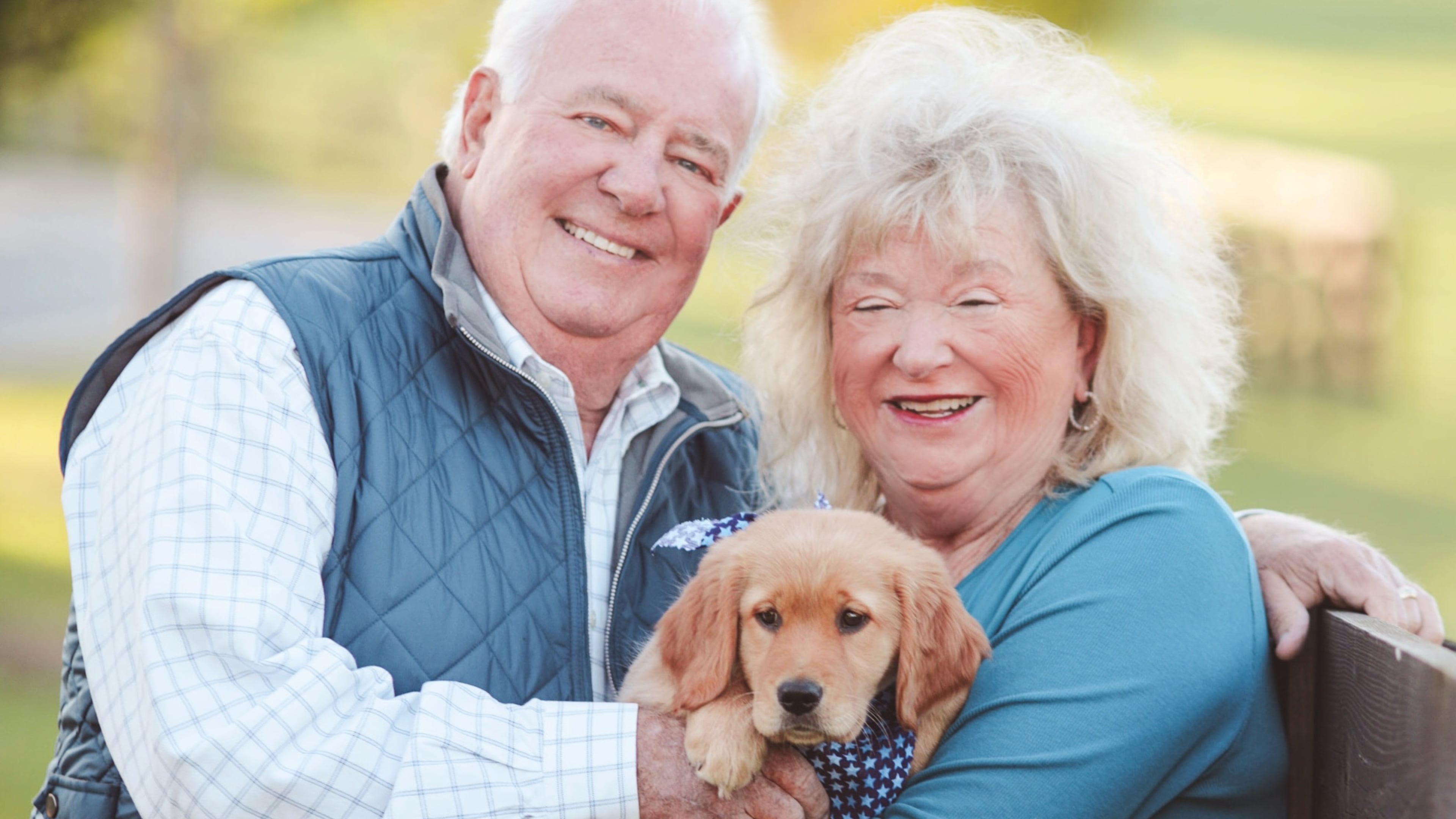 The late Joe Powell (left) with his wife, Sandy, and their dog, Lili. (Courtesy of the Powell family)