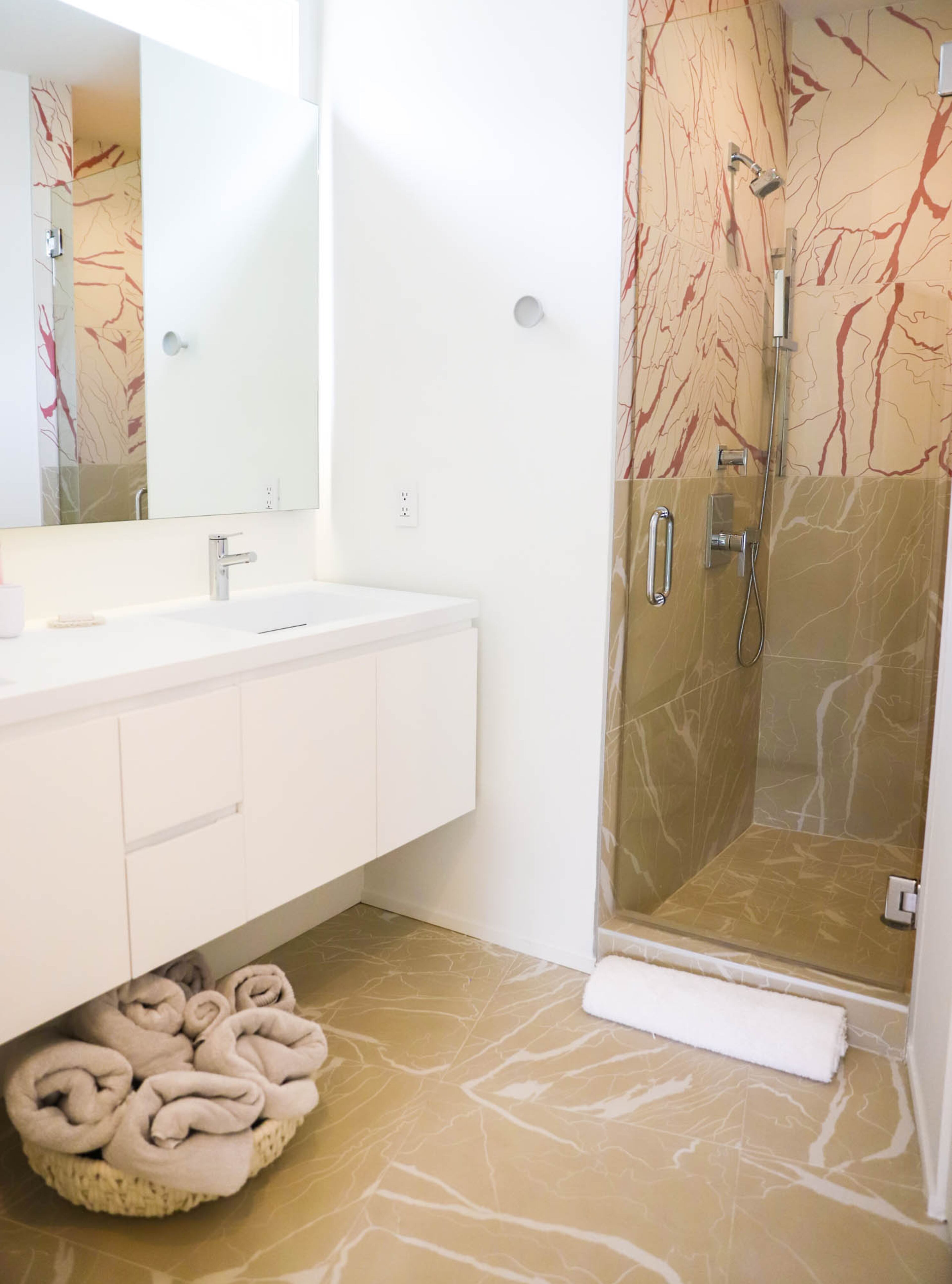 Instead of Italian marble, the homeowner selected ceramic tile with a pop art effect, from Ornamenta's Artwork collection, for the bathroom. Text by Lori Johnston/Fast Copy News Service. Photo by Reynolds Rogers/Fast Copy News Service.