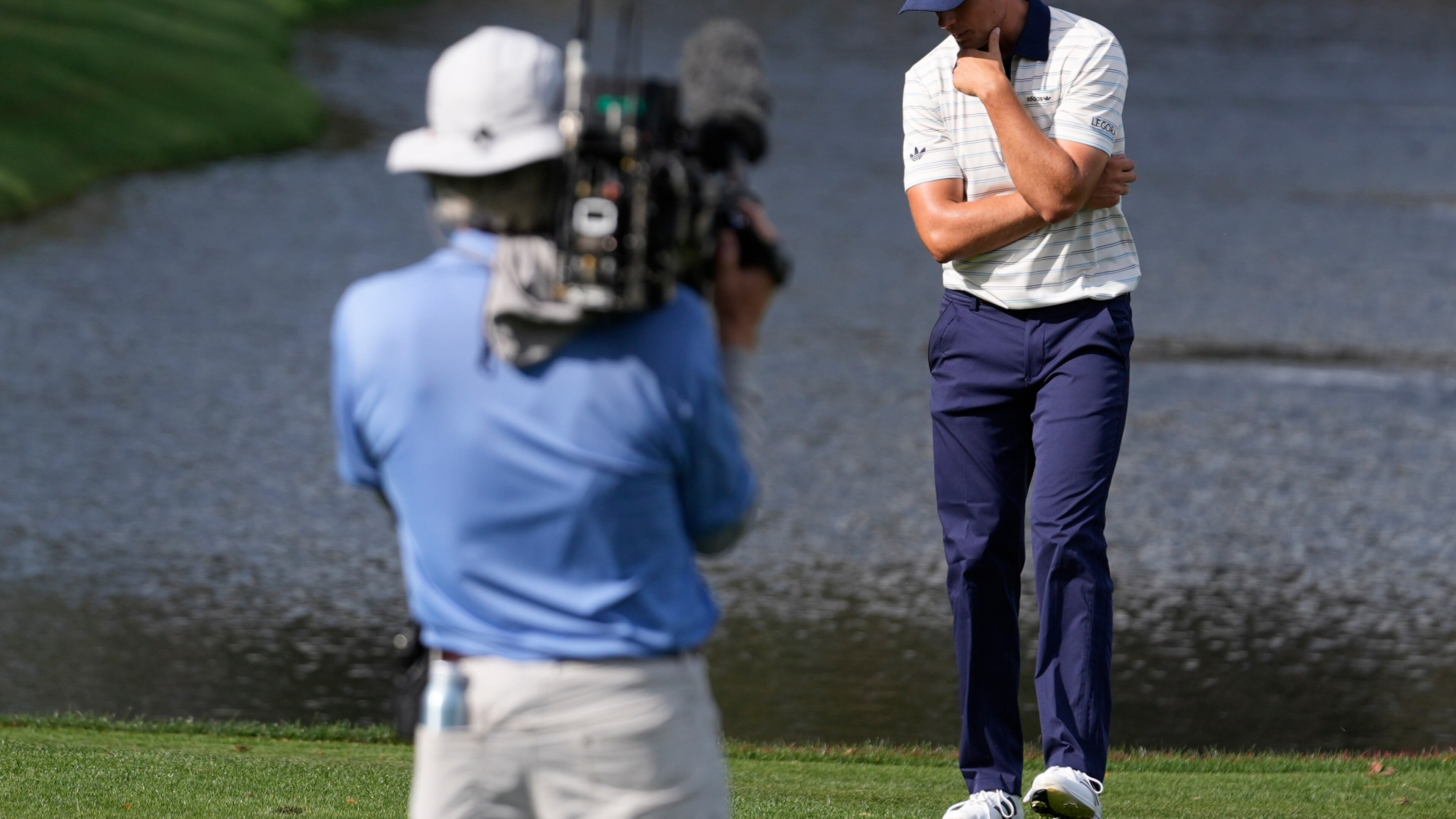 Ludvig Aberg of Sweden, reacts to his ball hitting the water on the 12th hole during the final round of The Players Championship golf tournament, Sunday, March 15, 2026, in Ponte Vedra Beach, Fla. (AP Photo/Gerald Herbert)