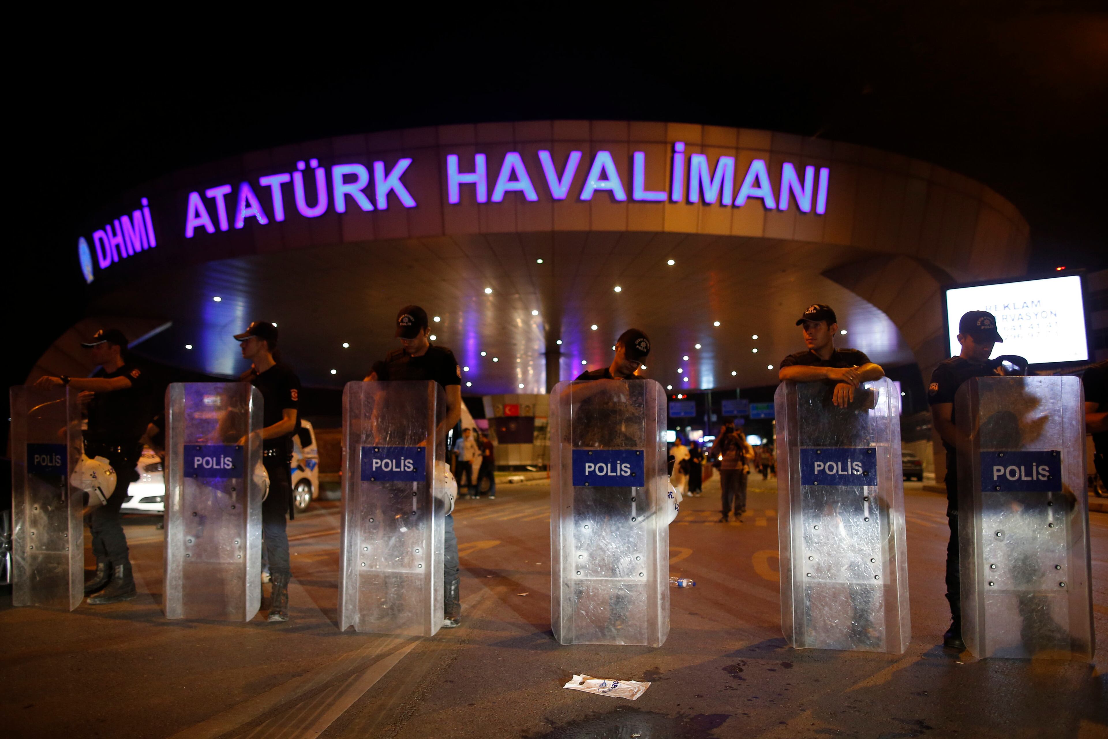 Turkish police block the entrance to Istanbul's Ataturk airport, early Wednesday, June 29, 2016. Two explosions have rocked Istanbul's Ataturk airport Tuesday, killing several people and wounding scores of others, Turkey's justice minister and another official said. A Turkish official says two attackers have blown themselves up at the airport after police fire at them. Turkish authorities have banned distribution of images relating to the Ataturk airport attack within Turkey. (AP Photo/Emrah Gurel)