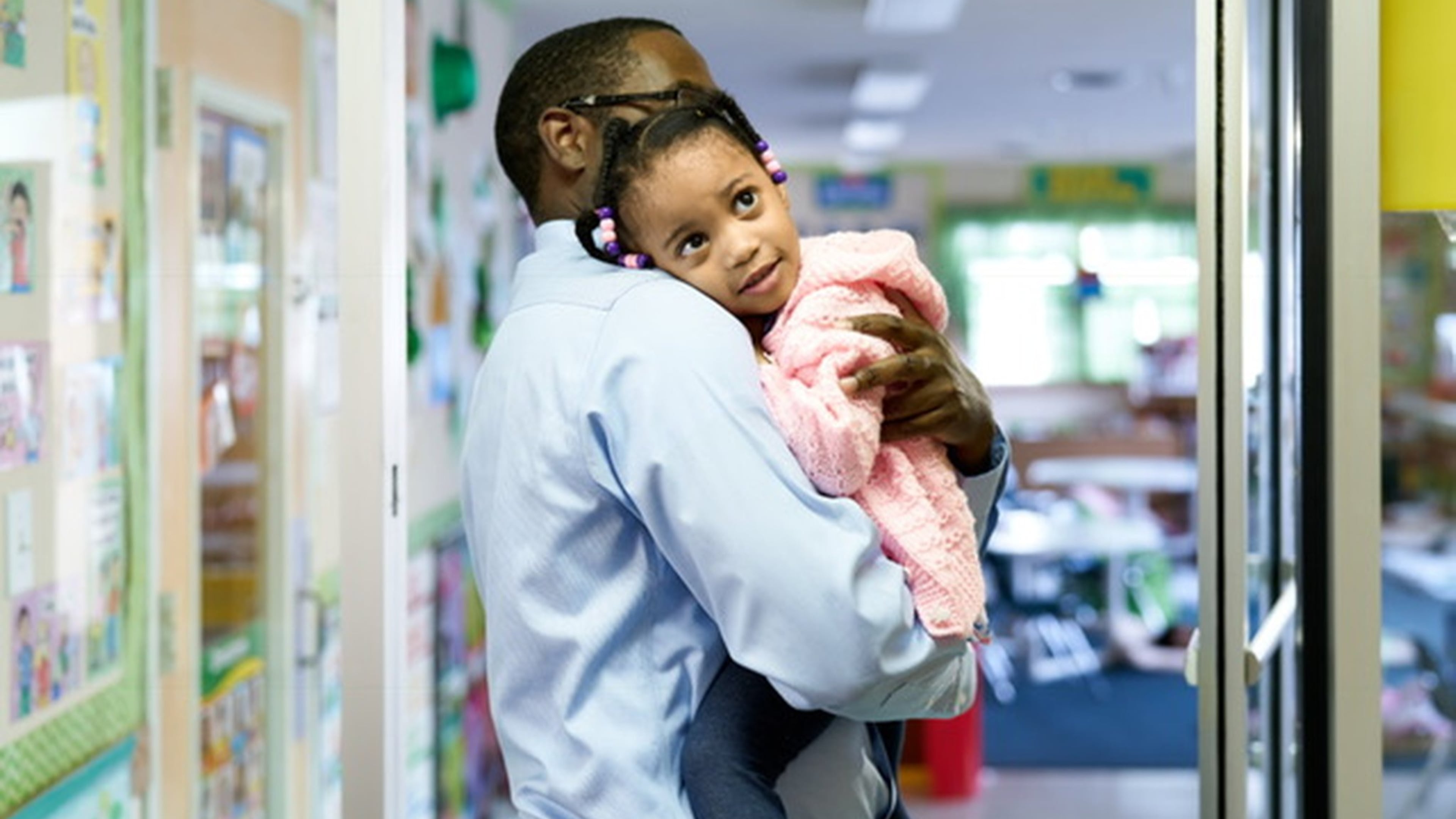 Quentin Harris and his daughter, Quinn. She was diagnosed with autism spectrum disorder over a year ago. It used to be hard to drop her off at day care, but therapy at the Marcus Autism Center helped change that. CONTRIBUTED