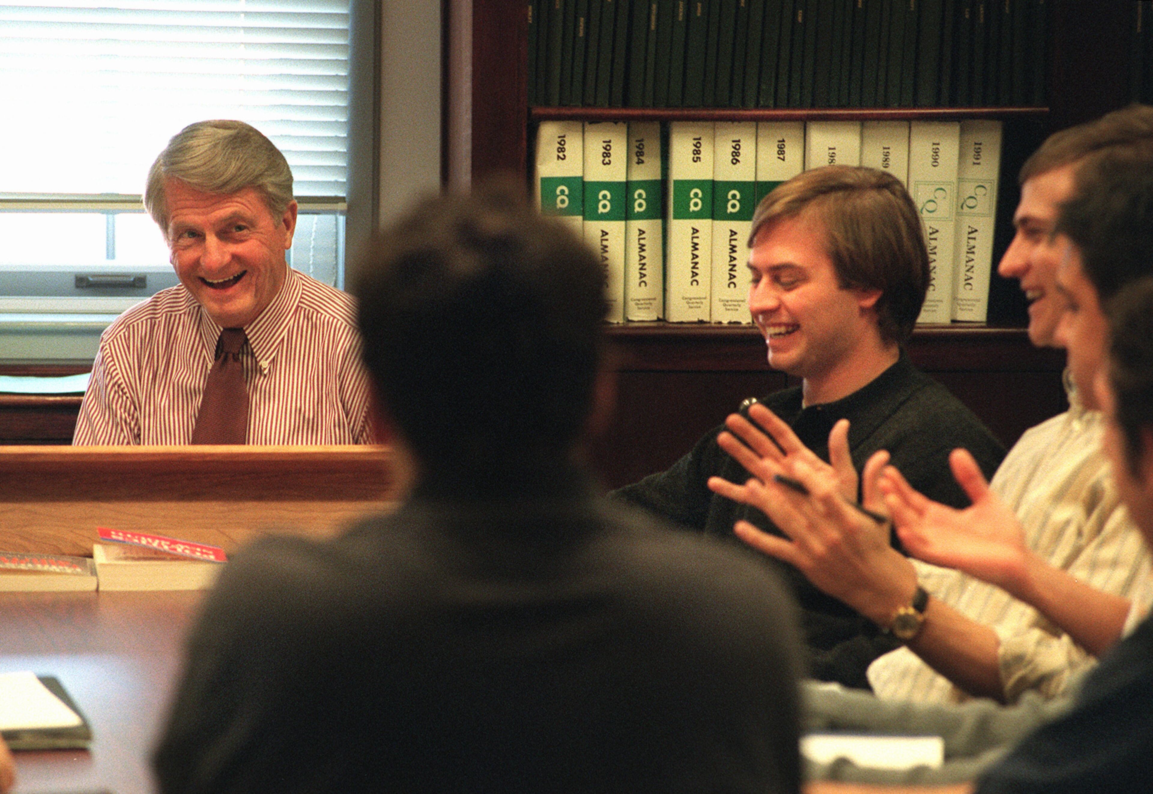 990119. ATLANTA. Former governor Zell Miller shares a laugh with students while waiting for his first political science class to begin at Emory University Tuesday, 1/19/99. The class, 'Southern Governors in a Time of Change', is for juniors, seniors and graduate students, and is limited to 12 students. The course will examine the South from the 1950's until the present, with an emphasis on several governors who made a significant difference, either positive or negative. Also explored will be their elections, their styles of leadership, their priorities and the things they left undone. RICH ADDICKS/STAFF
