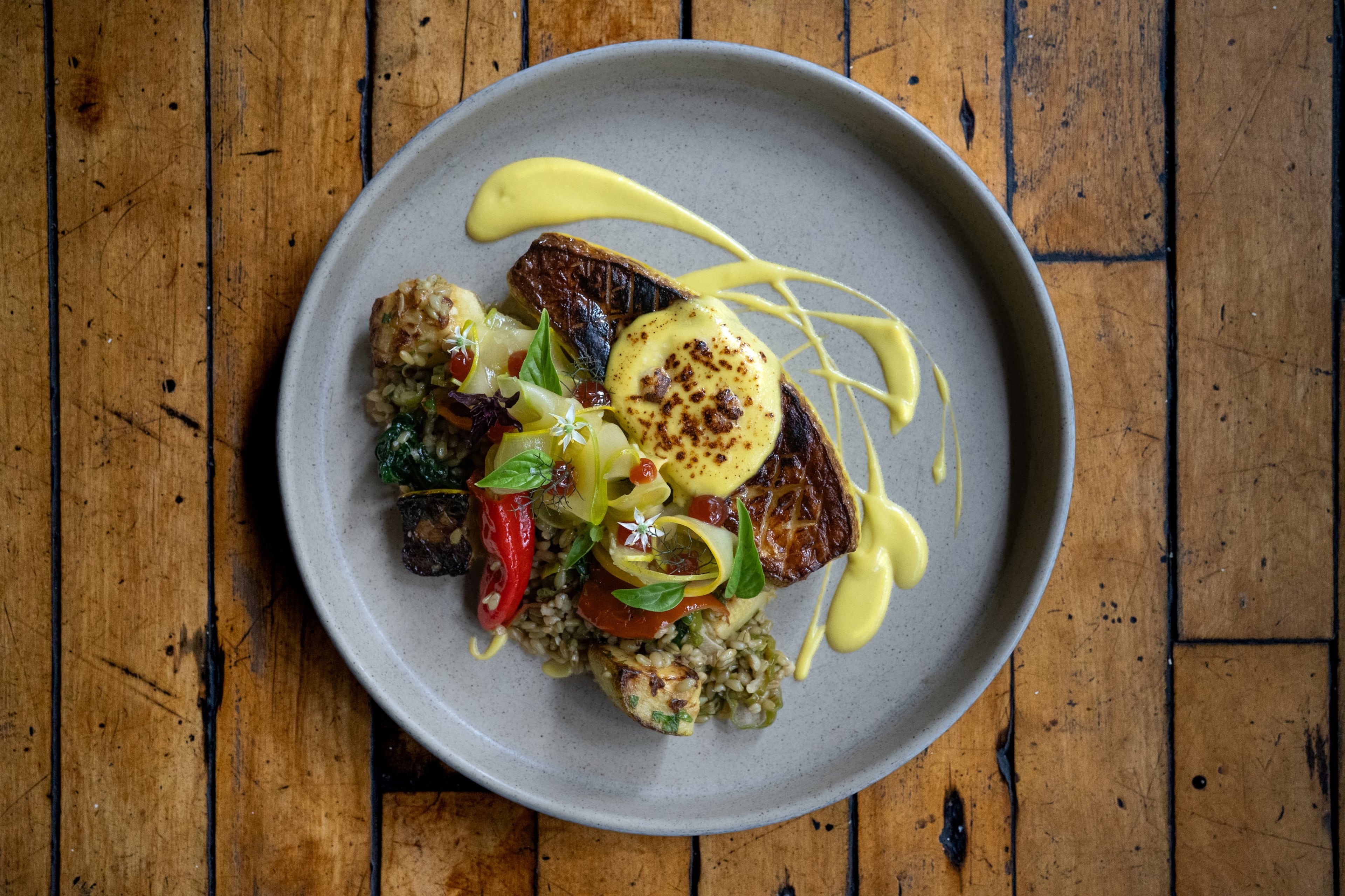 Decatur's the Deer and the Dove celebrates seasonal shifts with a harvest plate that features the bounty of local gardens. This month, squash is the star. (Courtesy of Morgan Campisi of Campisi Collective)