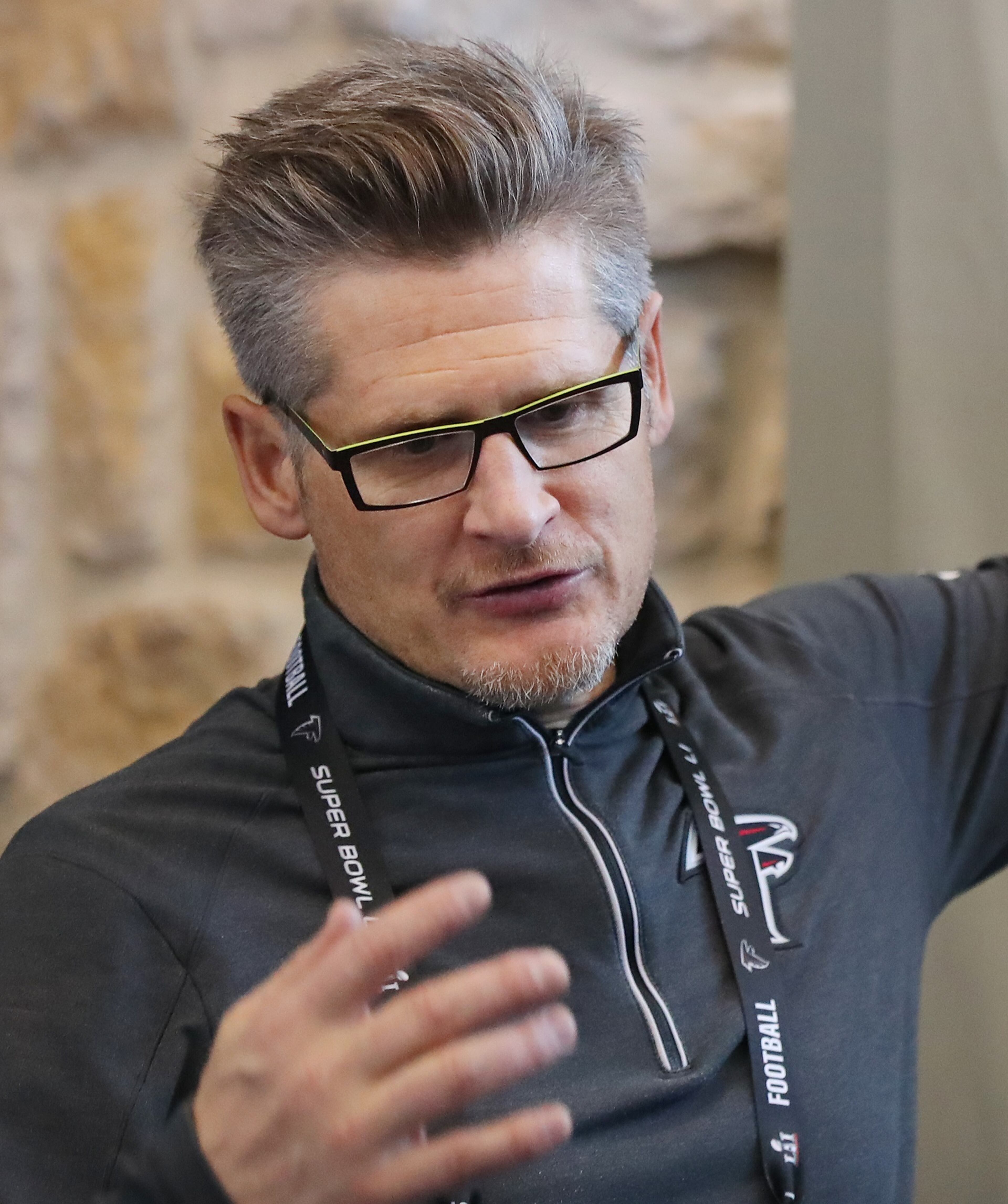 January 31, 2017, Houston: Falcons GM Thomas Dimitroff answers a question speaking with a reporter behind the scenes during media availability of the team on Tuesday, Jan. 31, 2017, at Memorial City Mall ice arena in Houston. Curtis Compton/ccompton@ajc.com