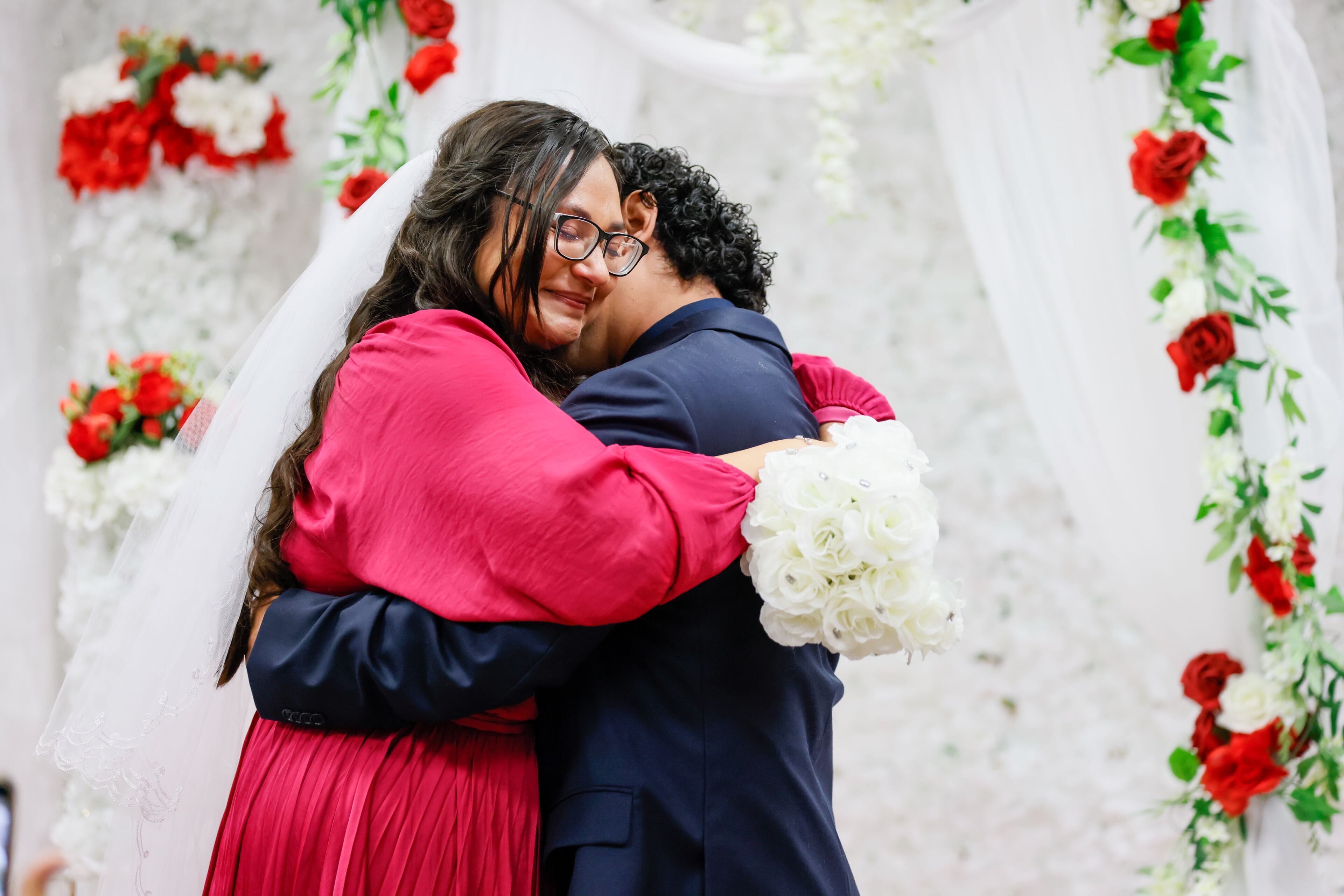 Ashley Morales embraces his now husband Crosby Pavon after they married during Valentine’s Day Free Weddings at the Fulton County Probate Court on Wednesday, Feb. 14, 2024, in Atlanta.
Miguel Martinez /miguel.martinezjimenez@ajc.com