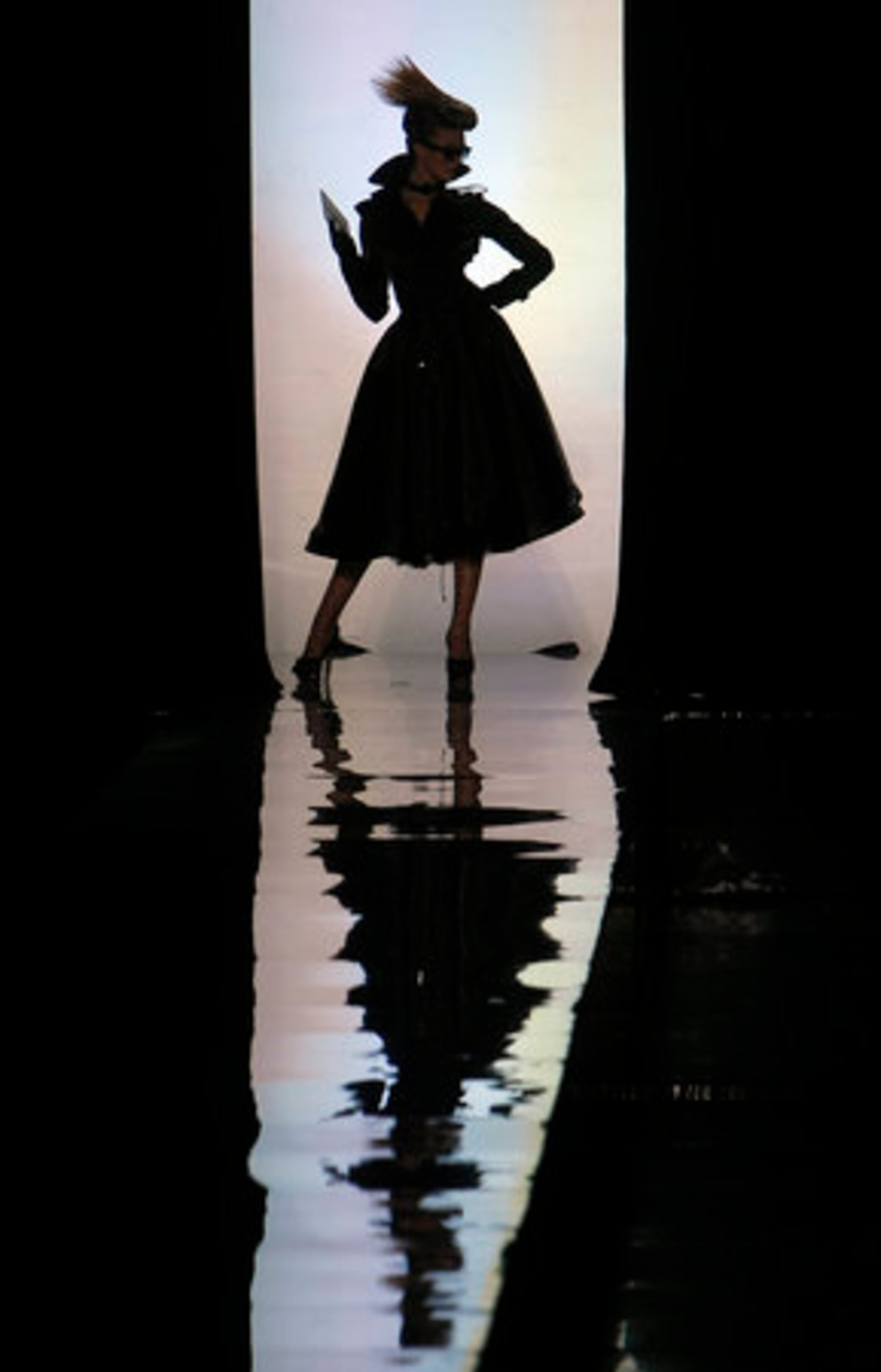 Only the voice of Catherine Deneuve reading the name, number and a brief description of each look could be heard.